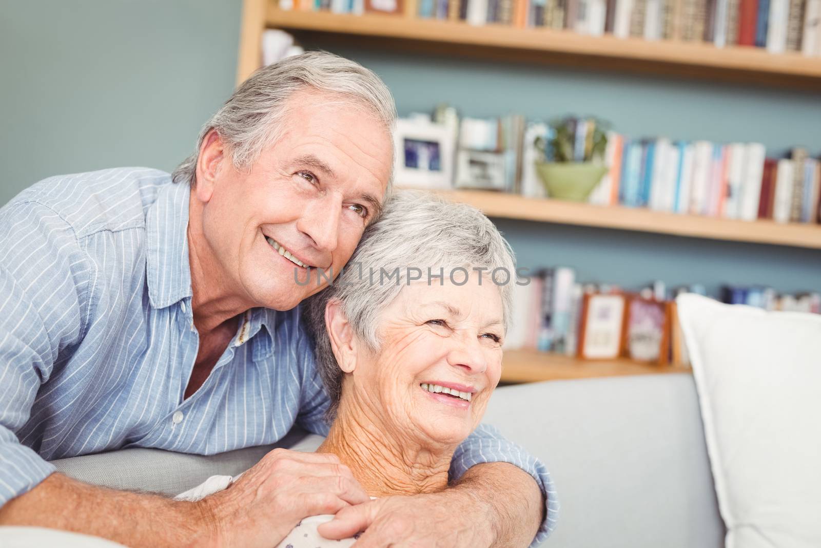 Romantic senior couple hugging by Wavebreakmedia