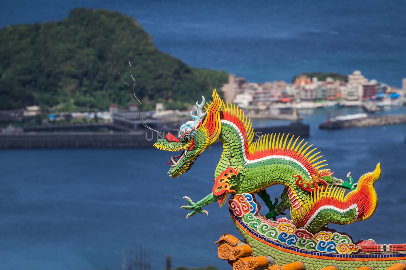 Dragon sculpture on roof of a Chinese temple.