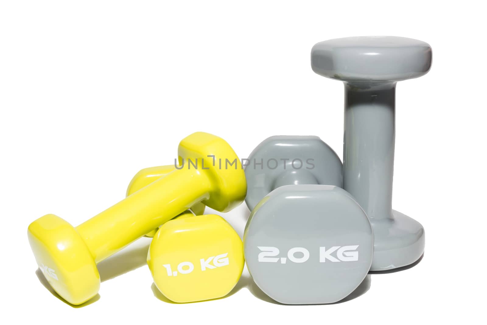 The photo shows a dumbbell on a white background