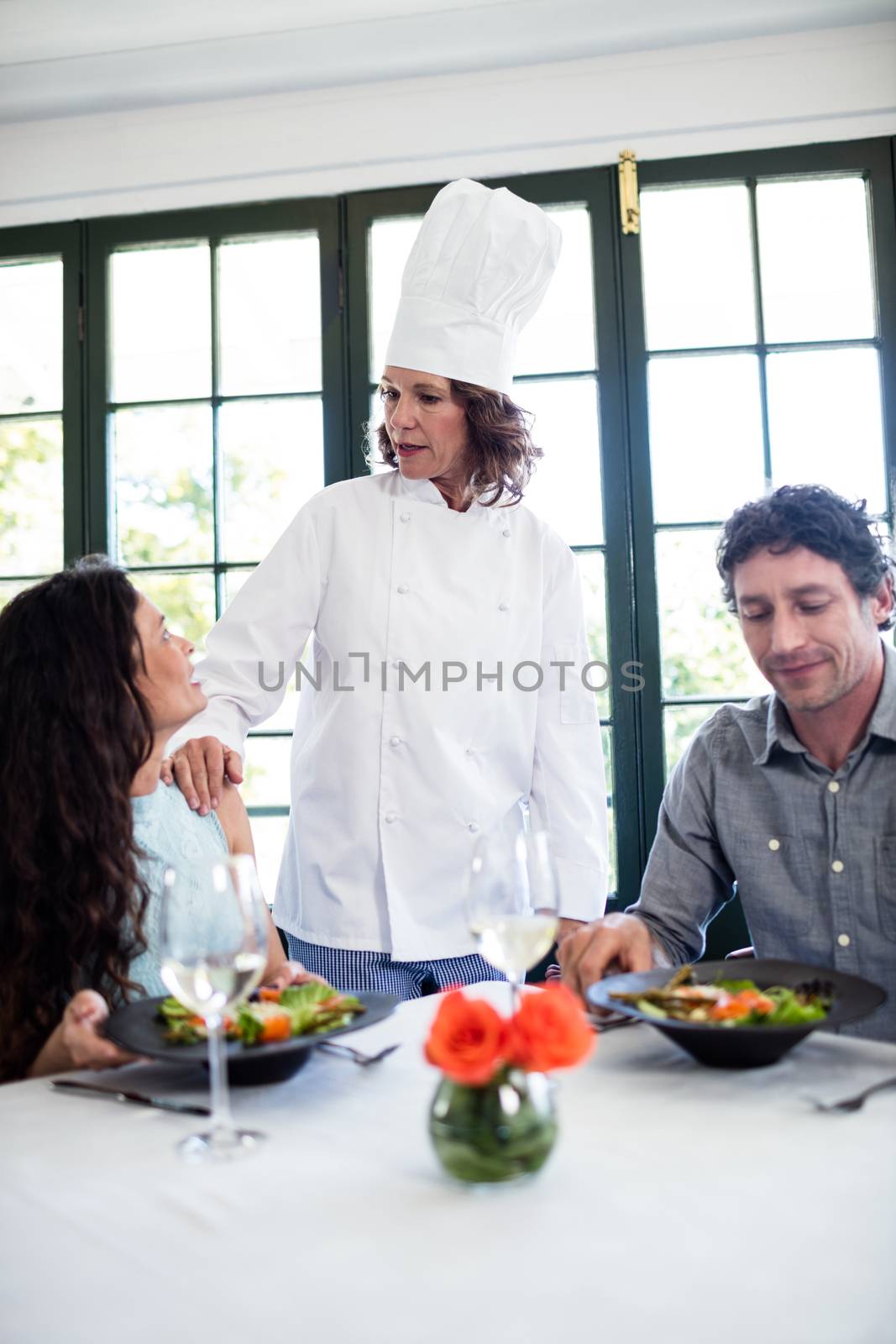 Couple complaining about the food to chef by Wavebreakmedia