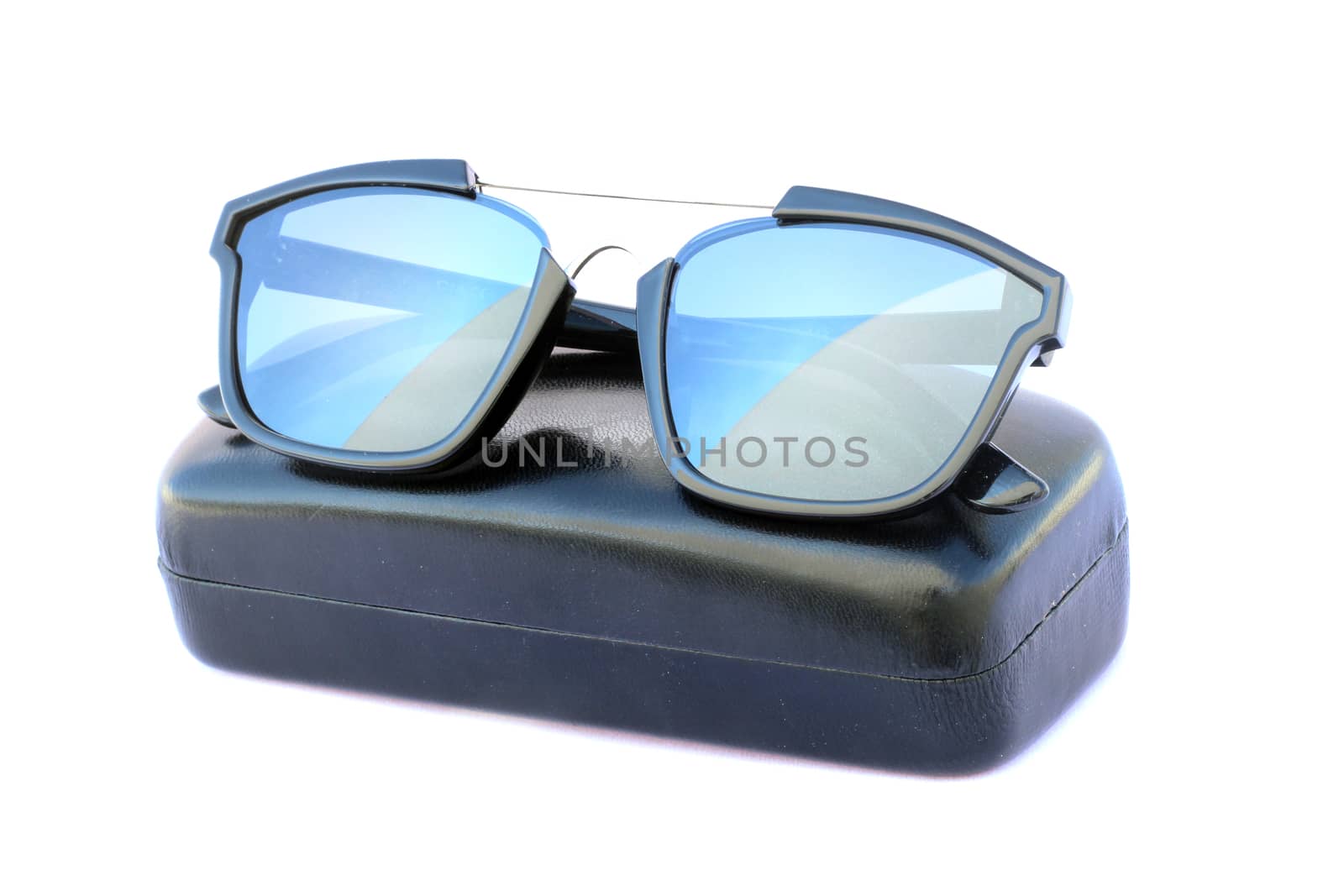 Image of sunglasses and black box on a white background