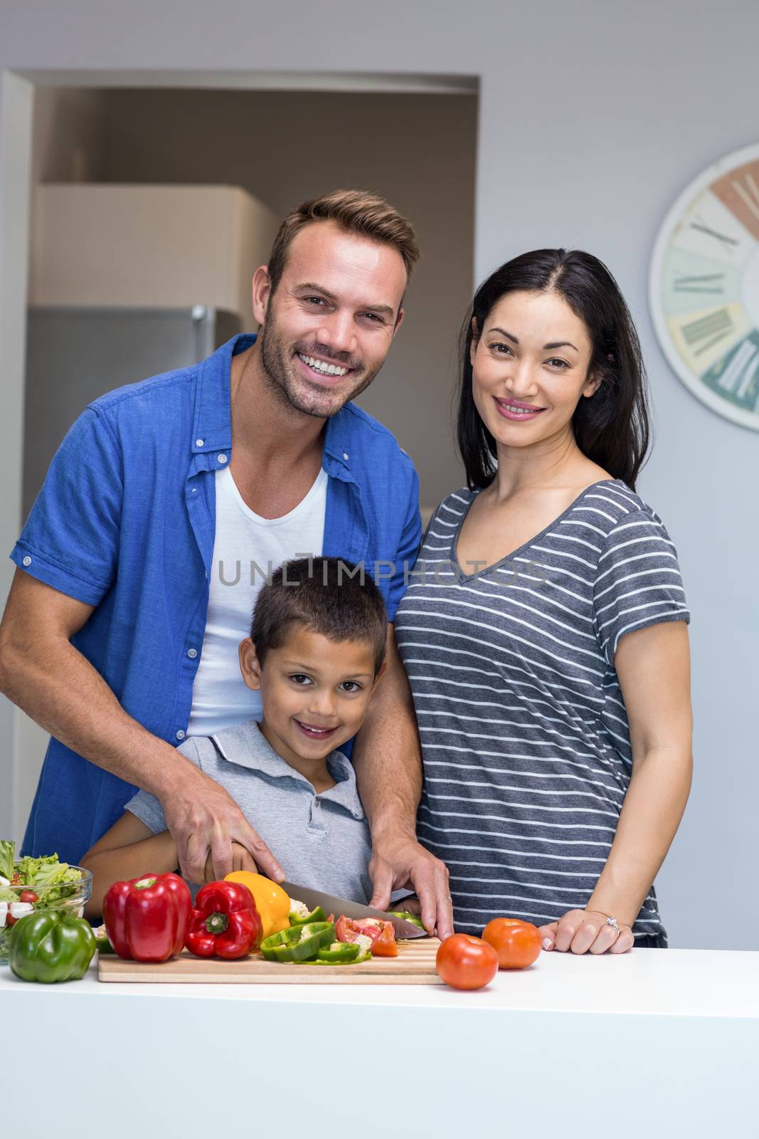 Happy family in the kitchen by Wavebreakmedia