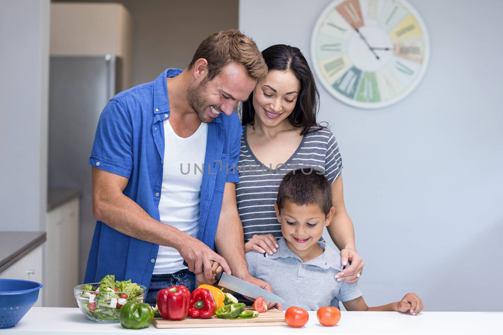 Happy family in the kitchen by Wavebreakmedia