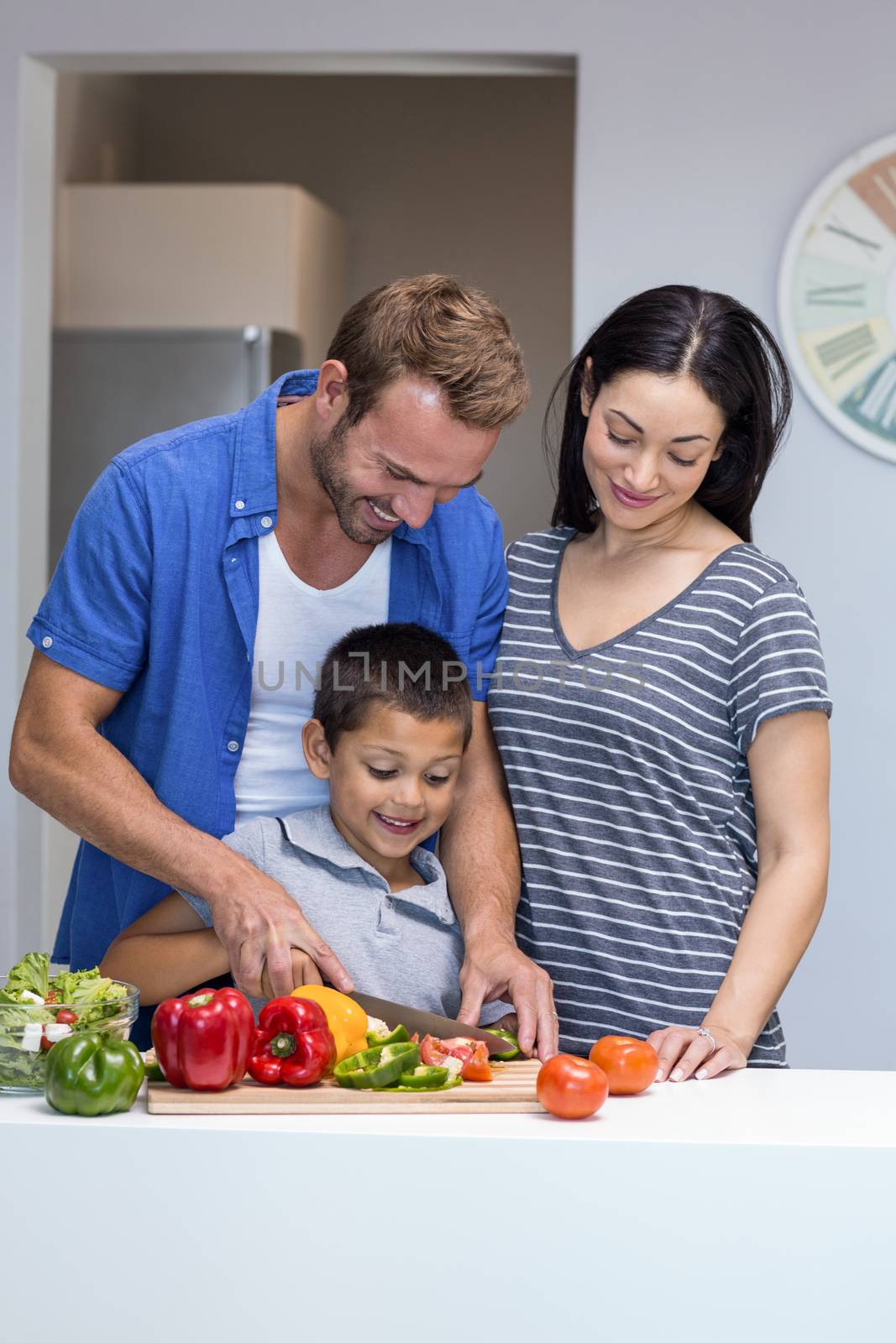 Happy family in the kitchen by Wavebreakmedia