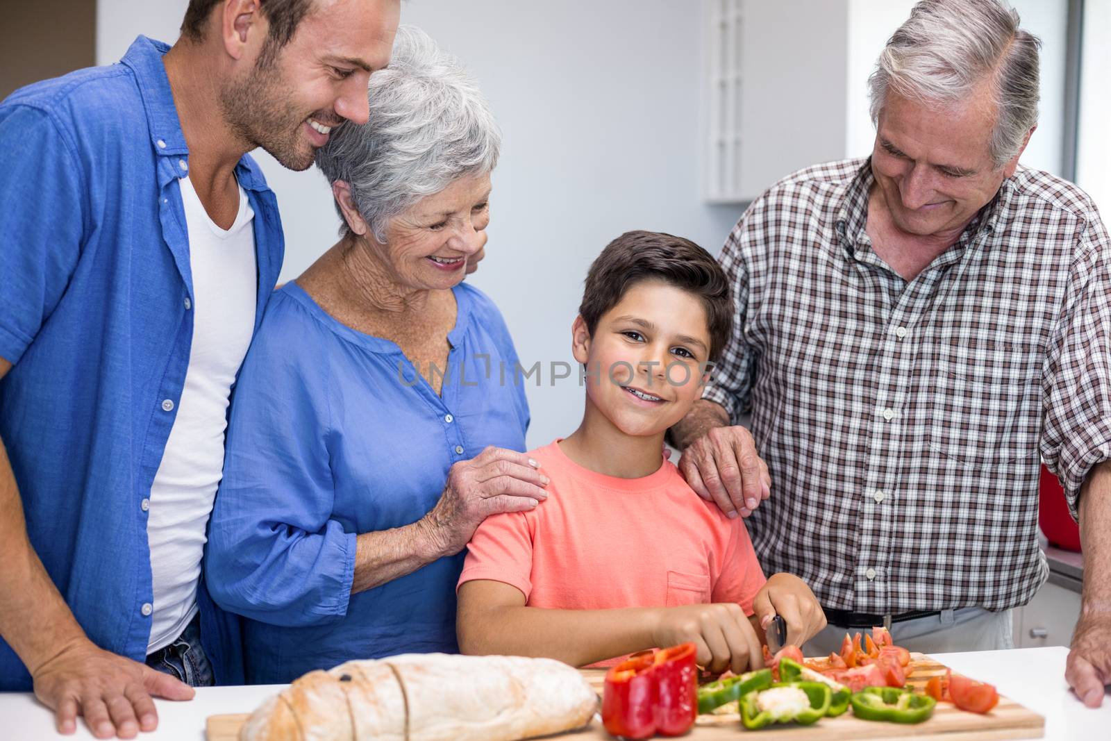 Happy family in the kitchen by Wavebreakmedia