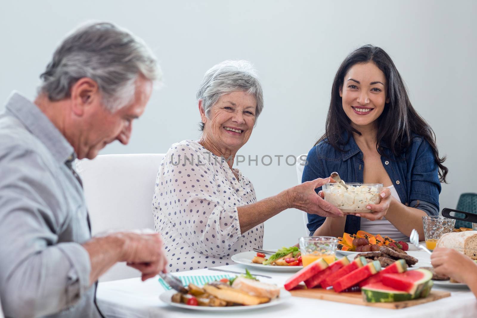 Happy family having breakfast in the morning