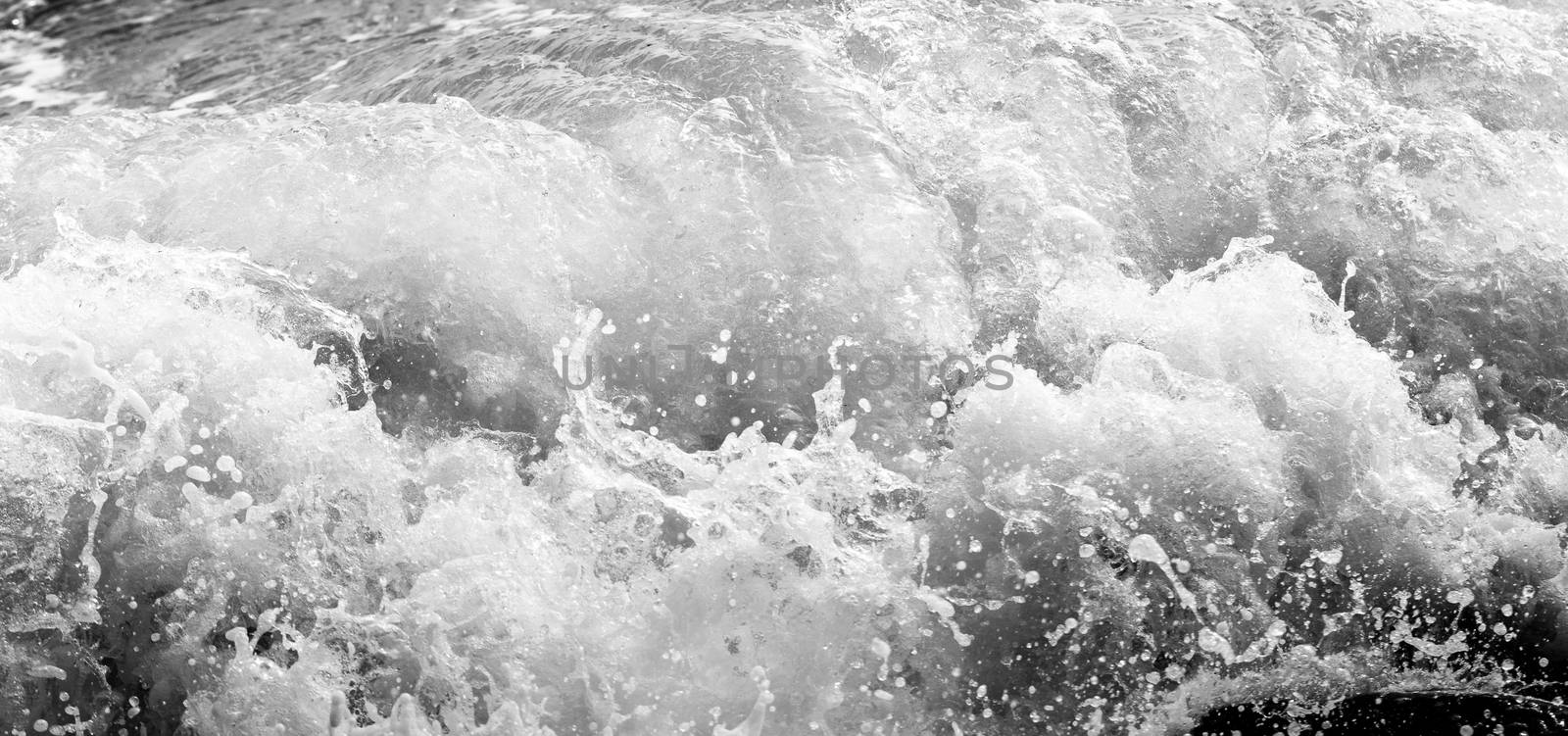 Black and white Beach rock and blue sea in Thailand