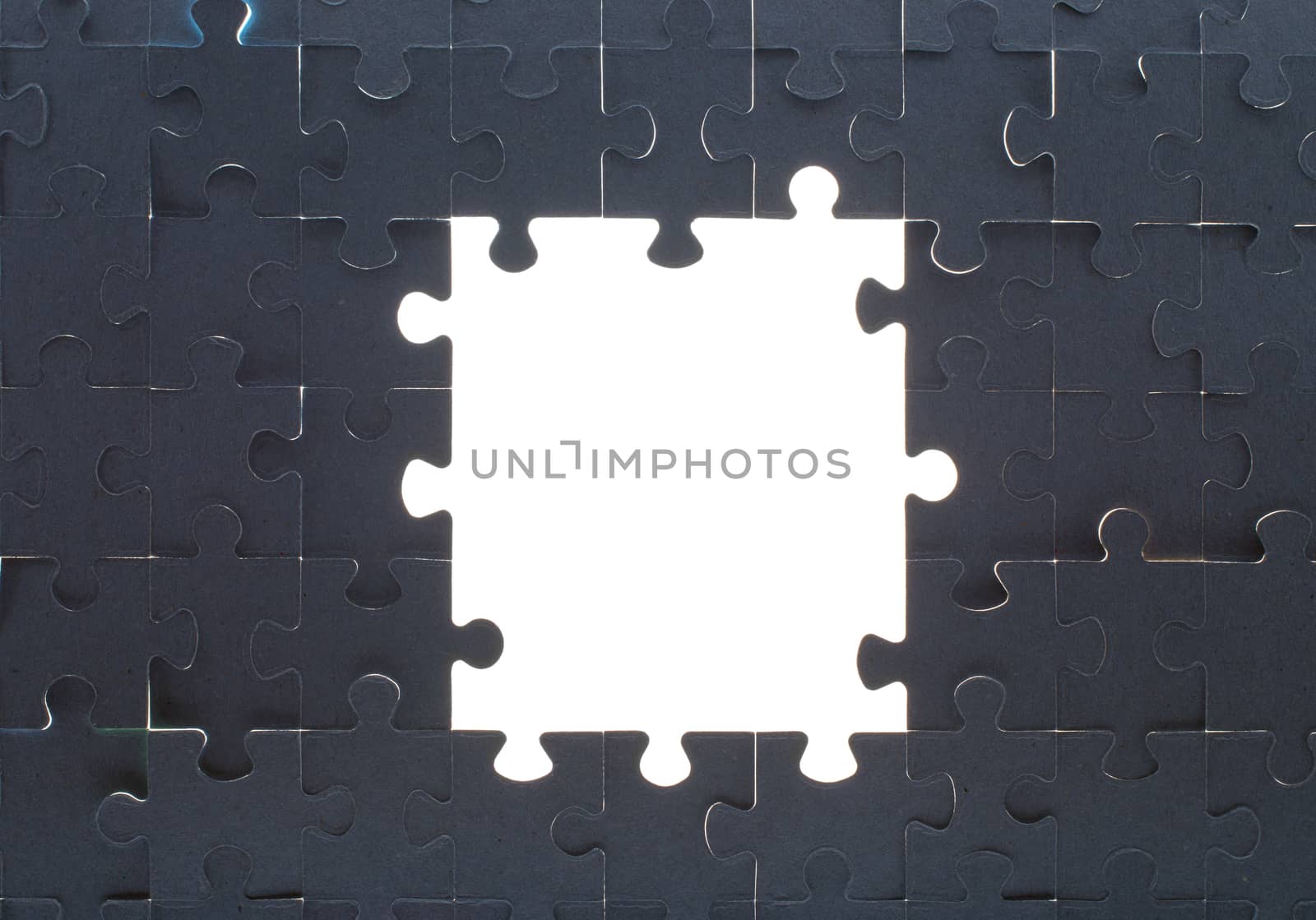 Grey puzzle background with empty space by cherezoff