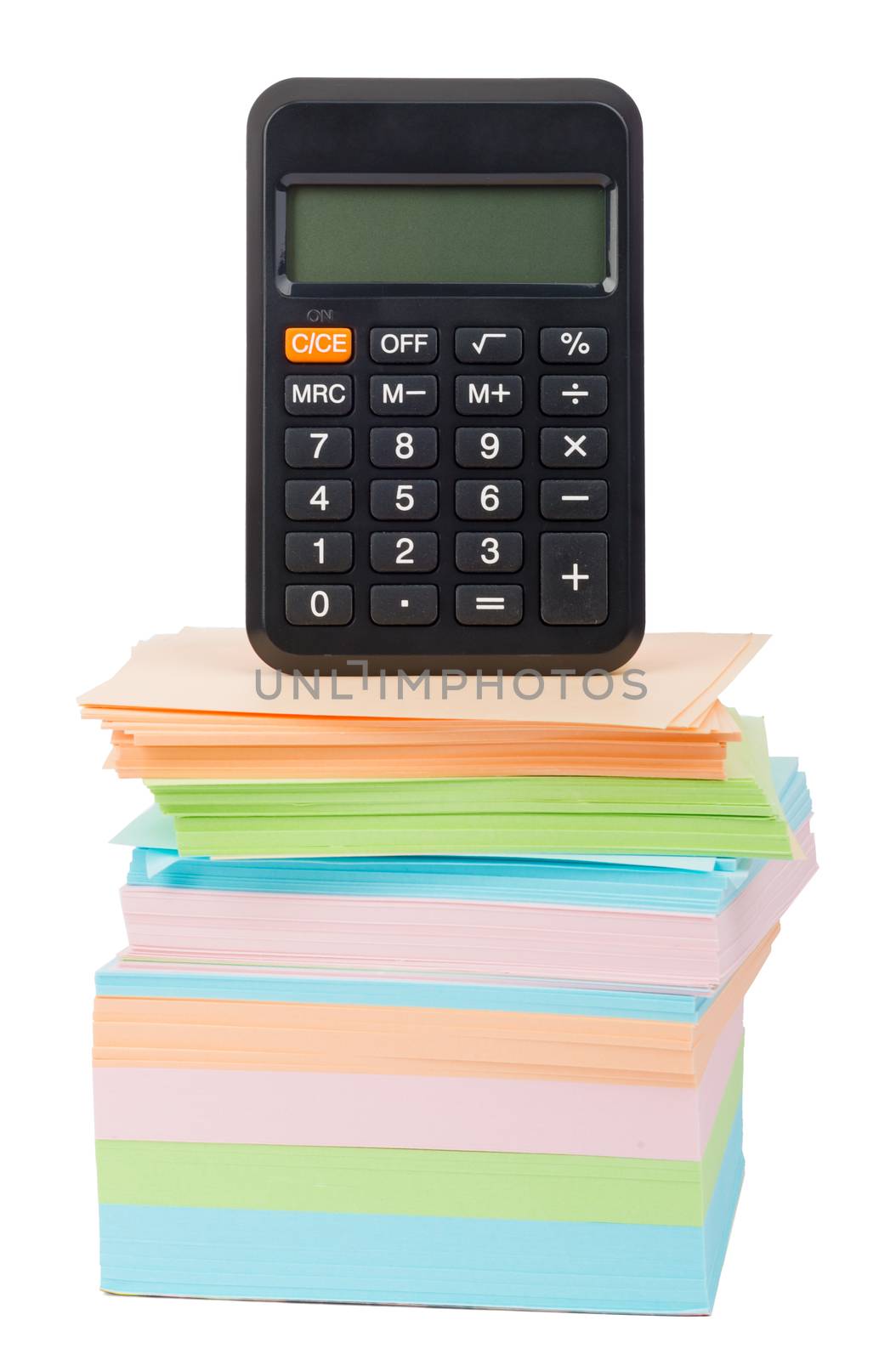Calculator on stack of stickers on isolated white background
