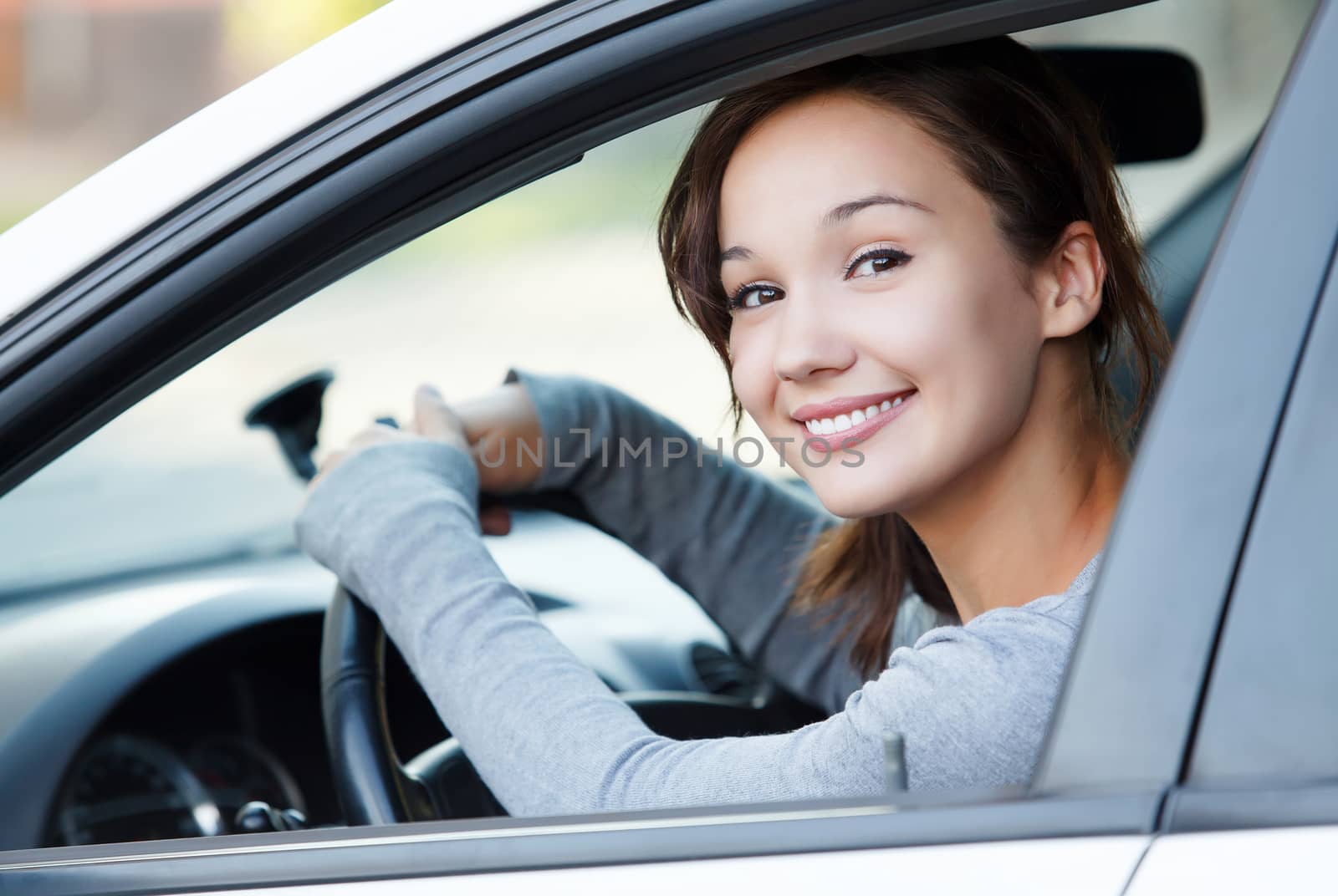 Pretty girl in a car