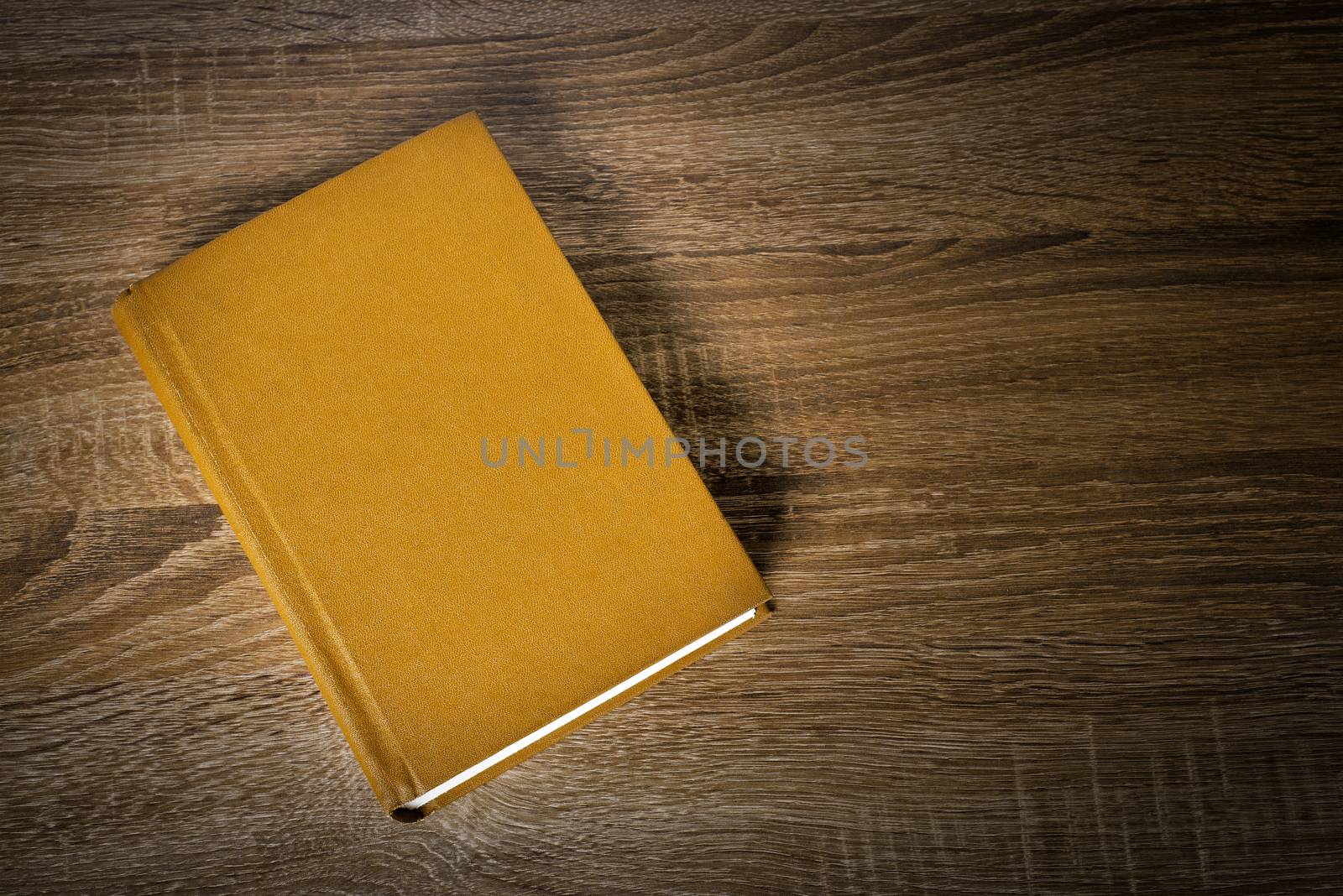 Yellow book on the table by nejuras