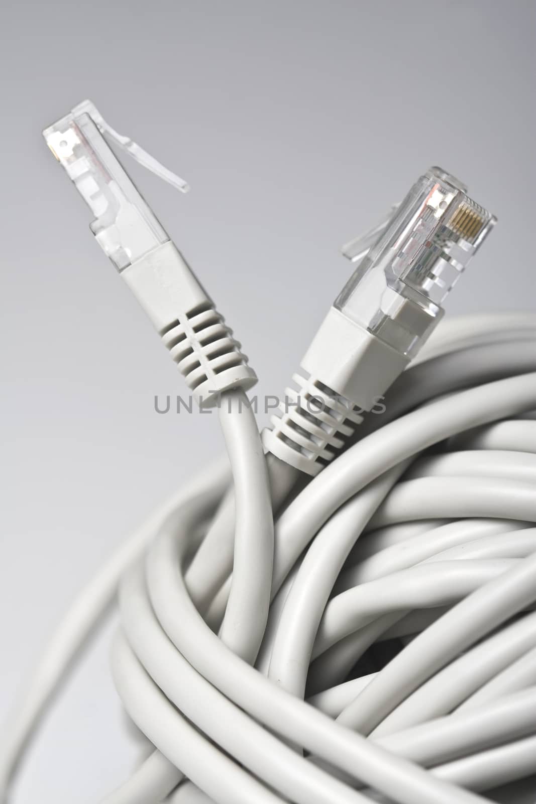 Vertical side view of two grey network cable sockets