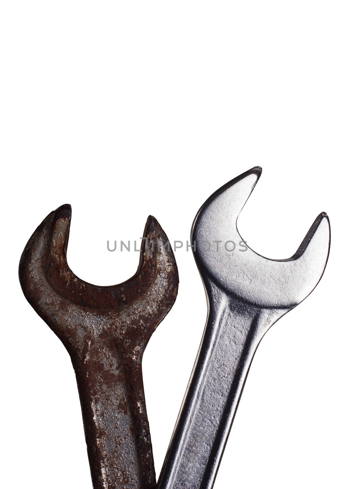 Two wrenches one rusted, one new on top of each other