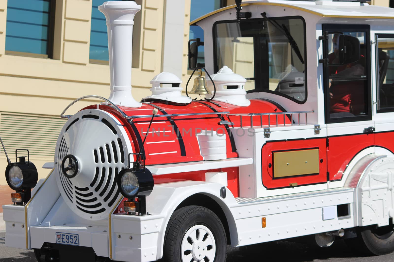 Monte-Carlo, Monaco - March 9, 2016: Red and White Trackless Train for Sightseeing in Monaco on the Street of Monte-Carlo, Monaco in the south of France