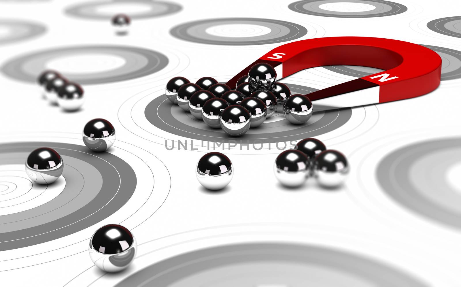 Horseshoe magnet attracting metal balls in the center of a grey target. Image concept of inbound marketing or advertising.