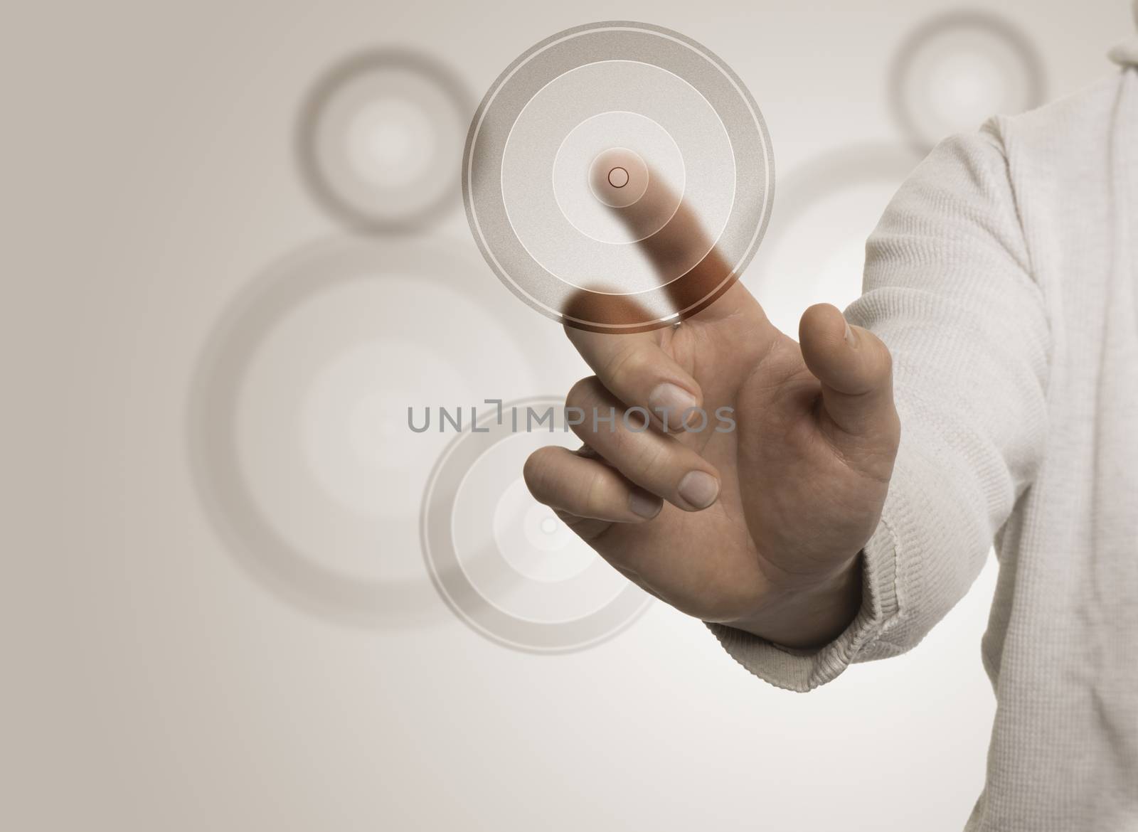 Man hand touching a transparent target with the index, beige background. Image suitable for a Marketing Concept or Business solutions with free space for text on the left 
