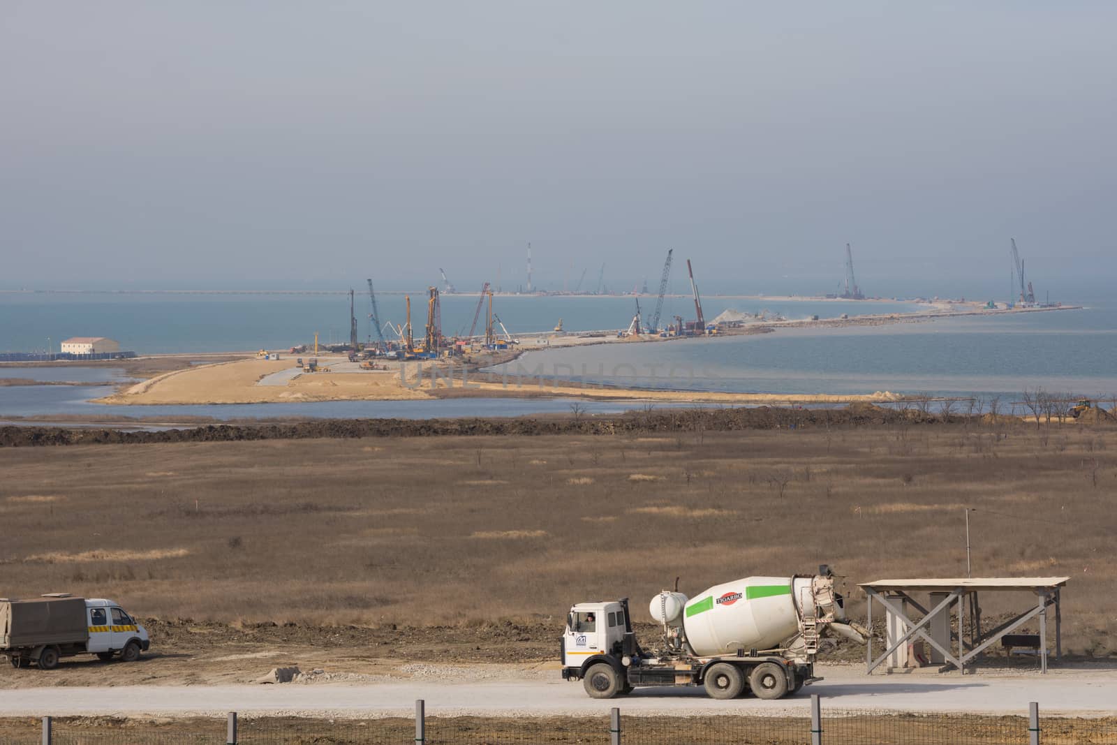Taman, Russia - March 8, 2016: A view of the Tuzla Spit and the construction of transport passage through the Kerch Strait from the Taman, which will connect the Kerch and Taman peninsula, as of March 2016