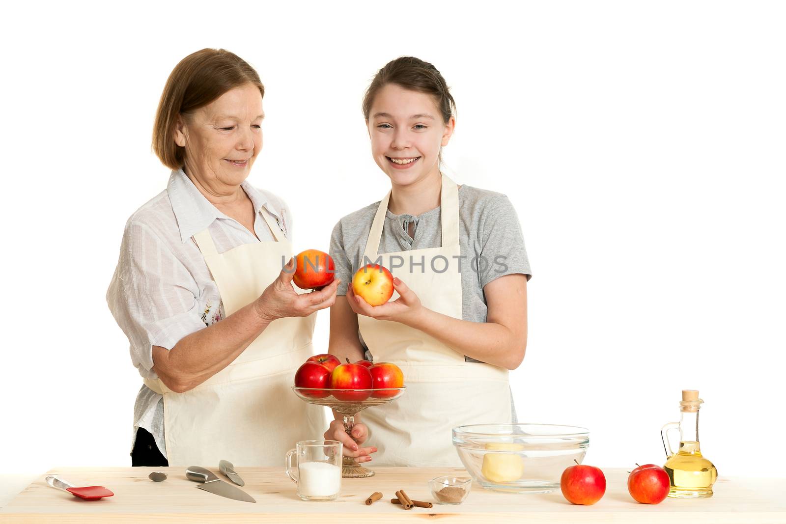 the grandmother and the granddaughter choose apples  by sveter