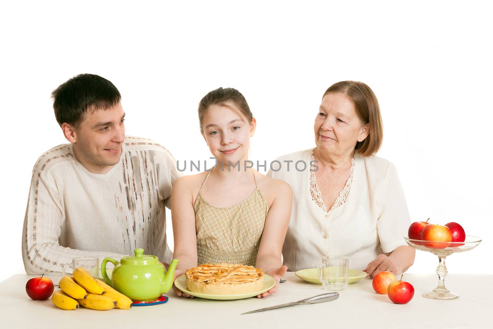 the grandmother and the granddaughter treat the father with pie by sveter