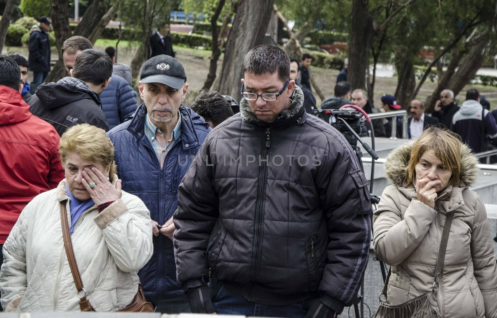 TURKEY, Ankara: People gather at a makeshift memorial for the victims of Sunday's suicide bomb attack in Ankara, on March 15, 2016 in Ankara, near the site of a suicide car bombing on March 13 that left 35 dead.Turkish warplanes pounded Kurdish rebel bases in northern Iraq on March 14, the day after a suicide car bomb tore through downtown Ankara killing at least 35 people, the third attack on the capital in five months. There was no immediate claim of responsibility for the latest carnage, which reduced cars and buses to charred hulks on a busy road in the heart of the city, wounding more than 120 people. 