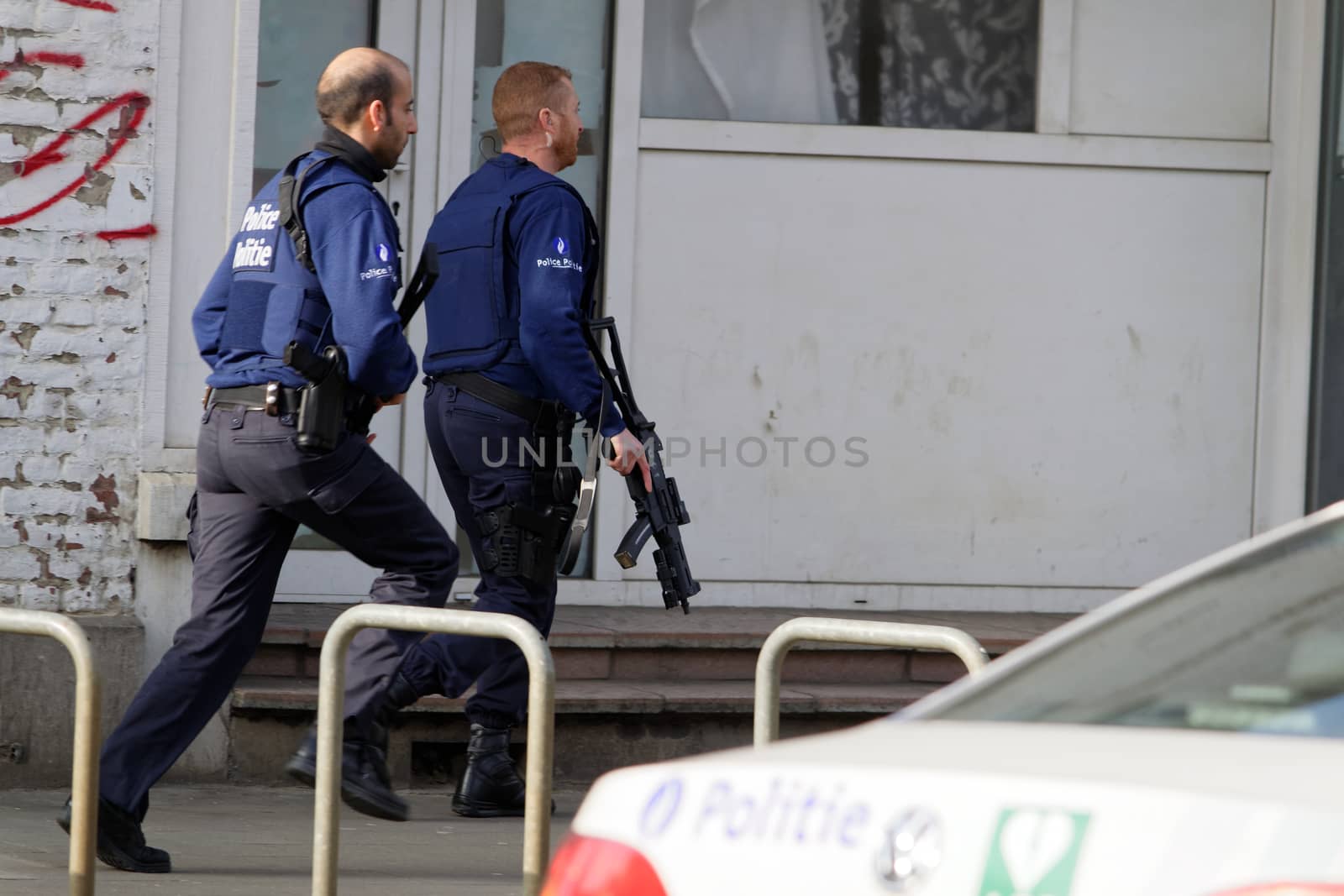 BELGIUM, Brussels: Police officers intervene at the site of a shooting on Dries-Driesstraat at Forest-Vorst, in Brussels, on March 15, 2016. Shots were fired at Belgian police in the capital Brussels as they carried out an operation linked to the Paris attacks, Belgian prosecutors told.