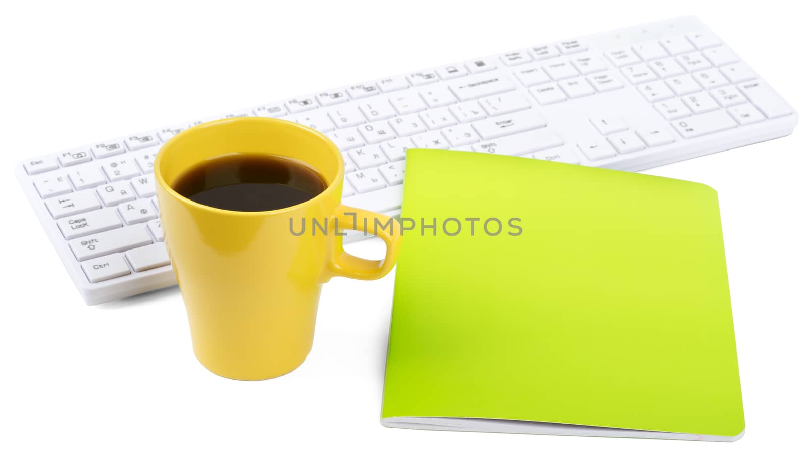 Keyboard with cup of coffee and notebook on isolated white background, closeup