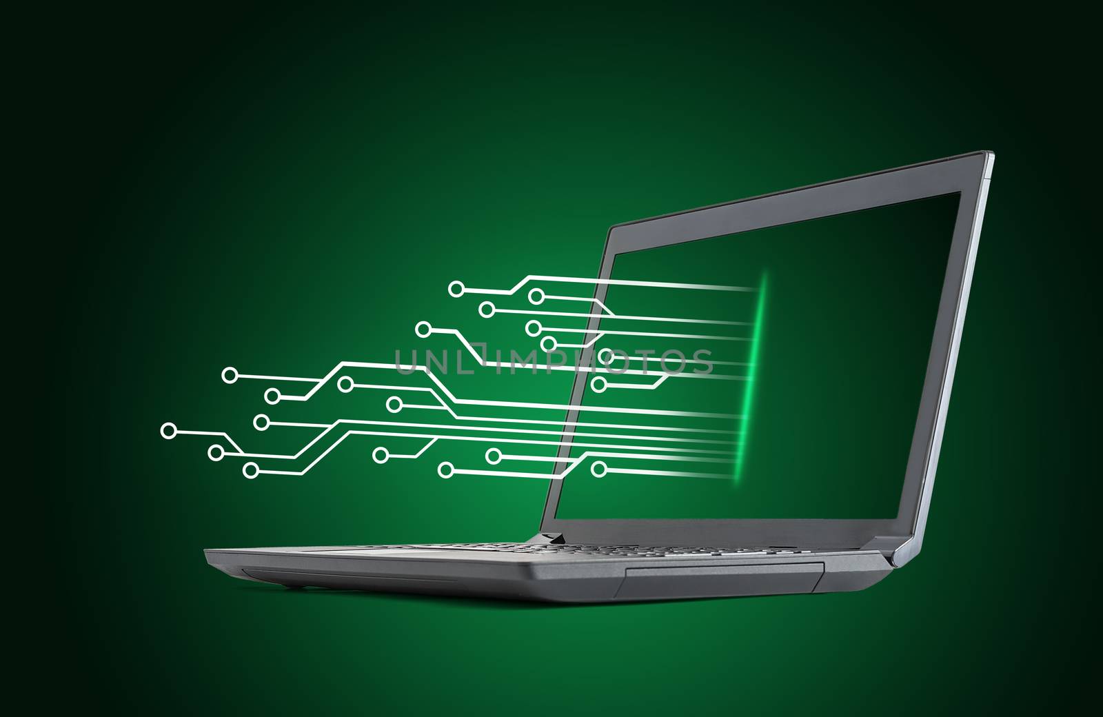 Black laptop with lightspot on green background