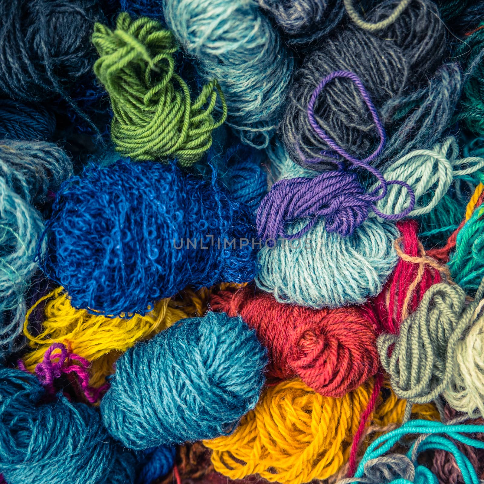 A Background Texture Of Different Types Of Balls Of  Wool