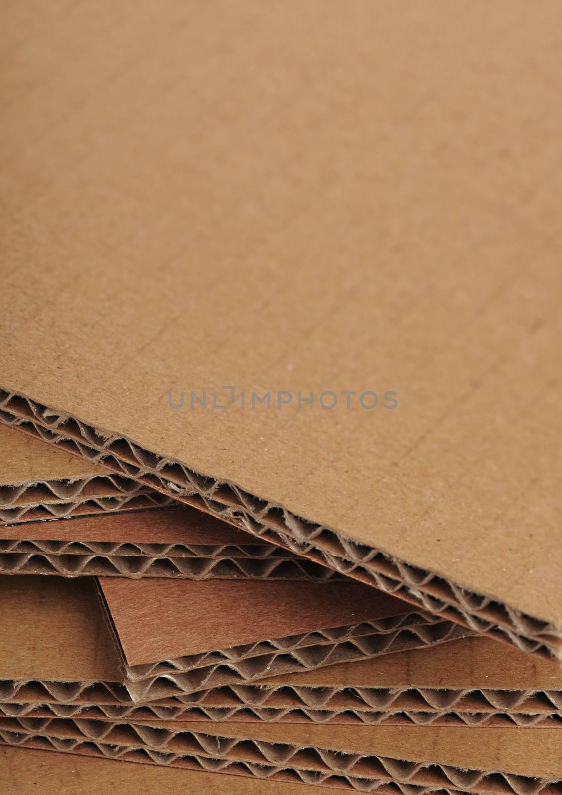 Corrugated cardboard sheets view of the side, free space on the top
