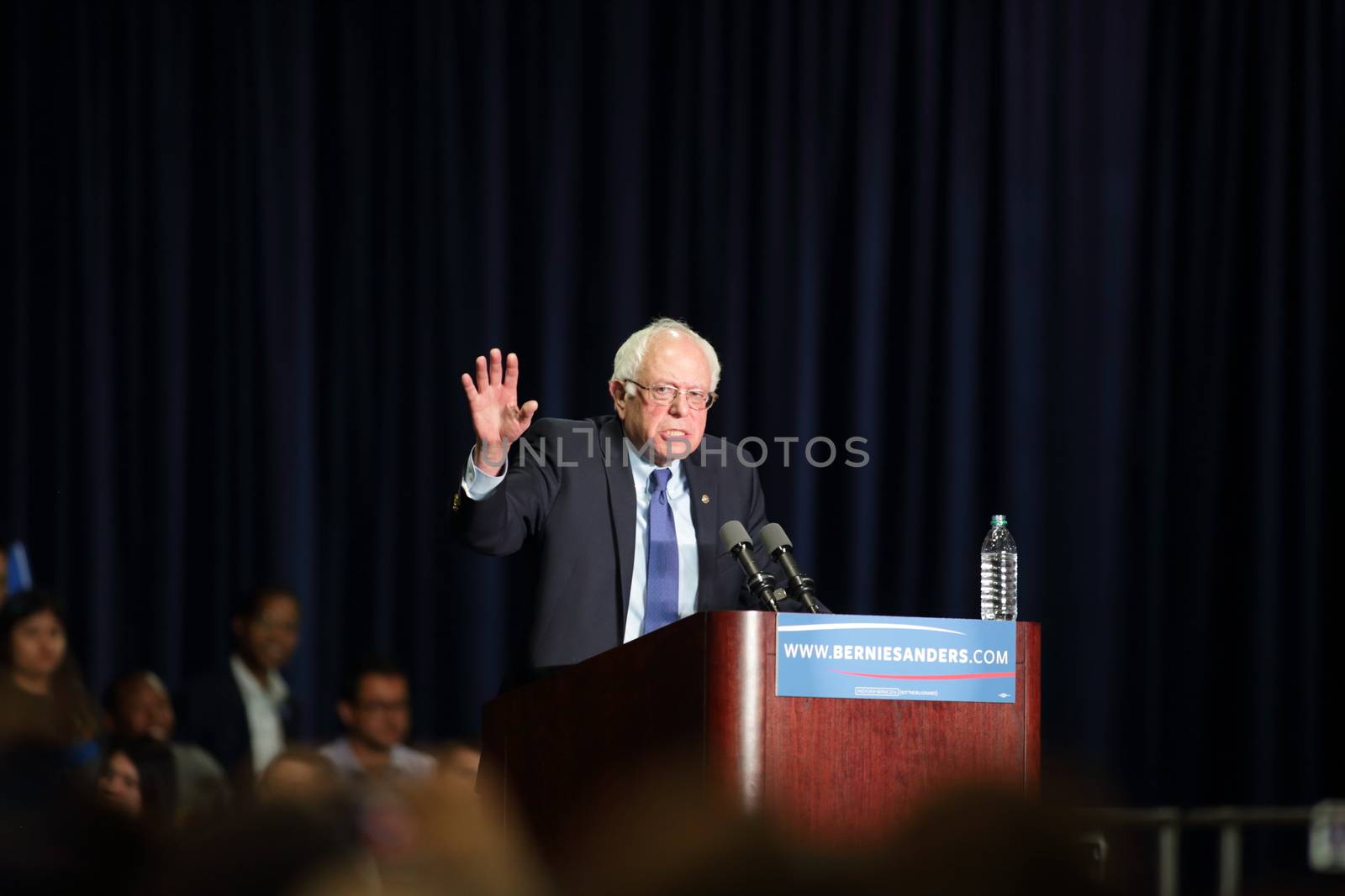 UNITED STATES, Phoenix: Democratic presidential candidate Sen. Bernie Sanders speaks to a crowd gathered at the Phoenix Convention Center during a campaign rally on March 15, 2016 in Phoenix, Arizona. Hillary Clinton won the Democratic primary elections in Florida, North Carolina and Ohio, while Missouri and Illinois remain tight races.