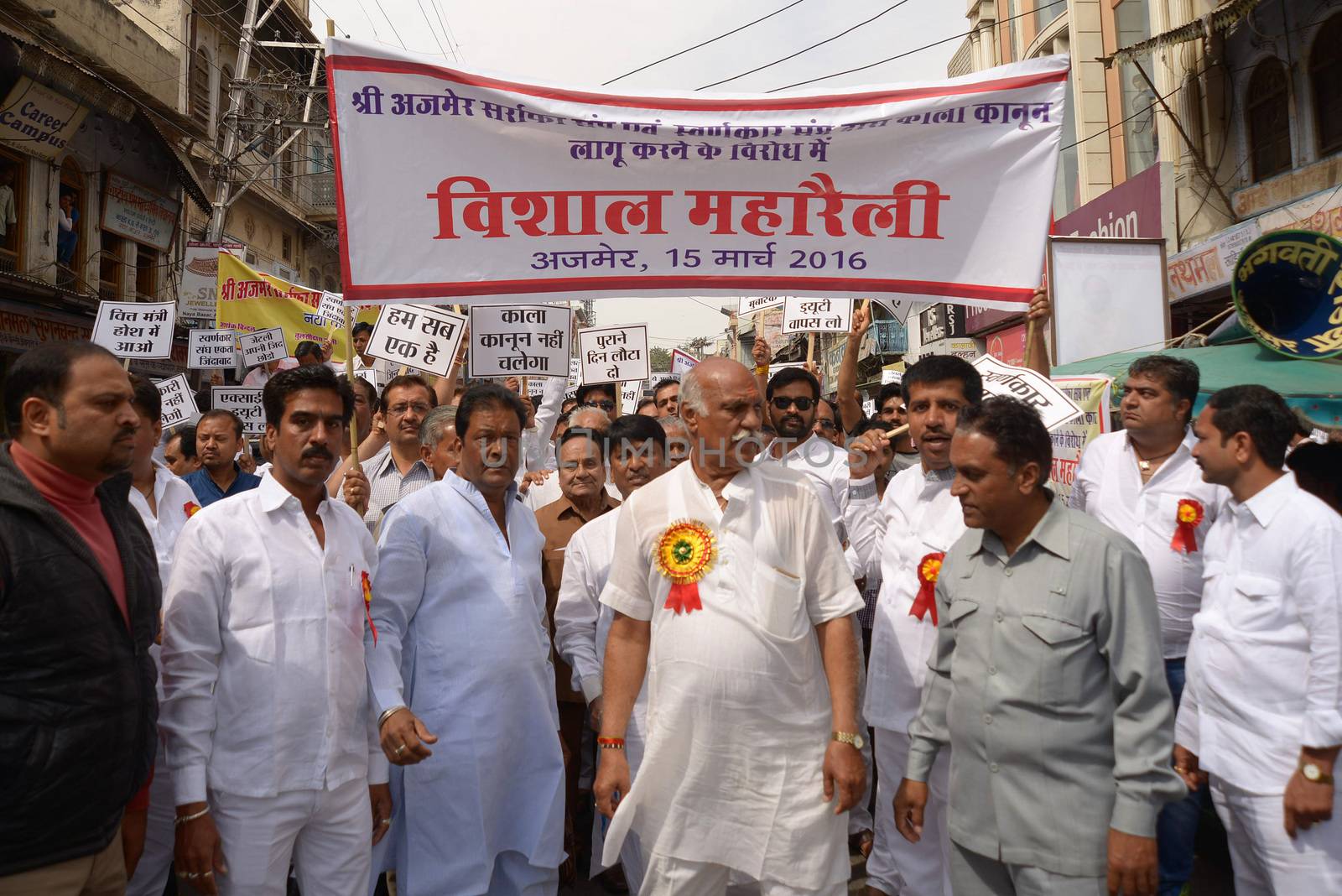 INDIA, Ajmer: Indian jewellers hold banners against the government during a protest against excise duties on gold in Ajmer on March 15, 2016.Jewellers across India are on an indefinite strike in a bid to force the government to shelve plans for a controversial excise tax announced in the annual budget 