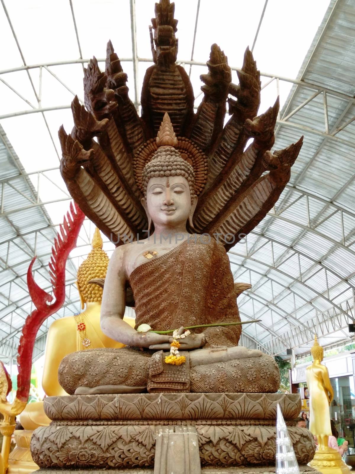 Image of Buddha with serpent in the Buddhist Temple, Wat Saman Rattanaram Temple, Chachoengsao, Thailand