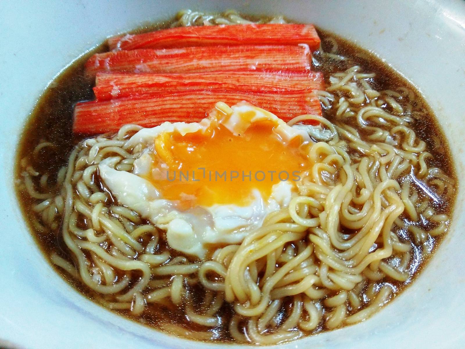 Instant noodles with a Soft-boiled egg and four red Imitation Crab Stick