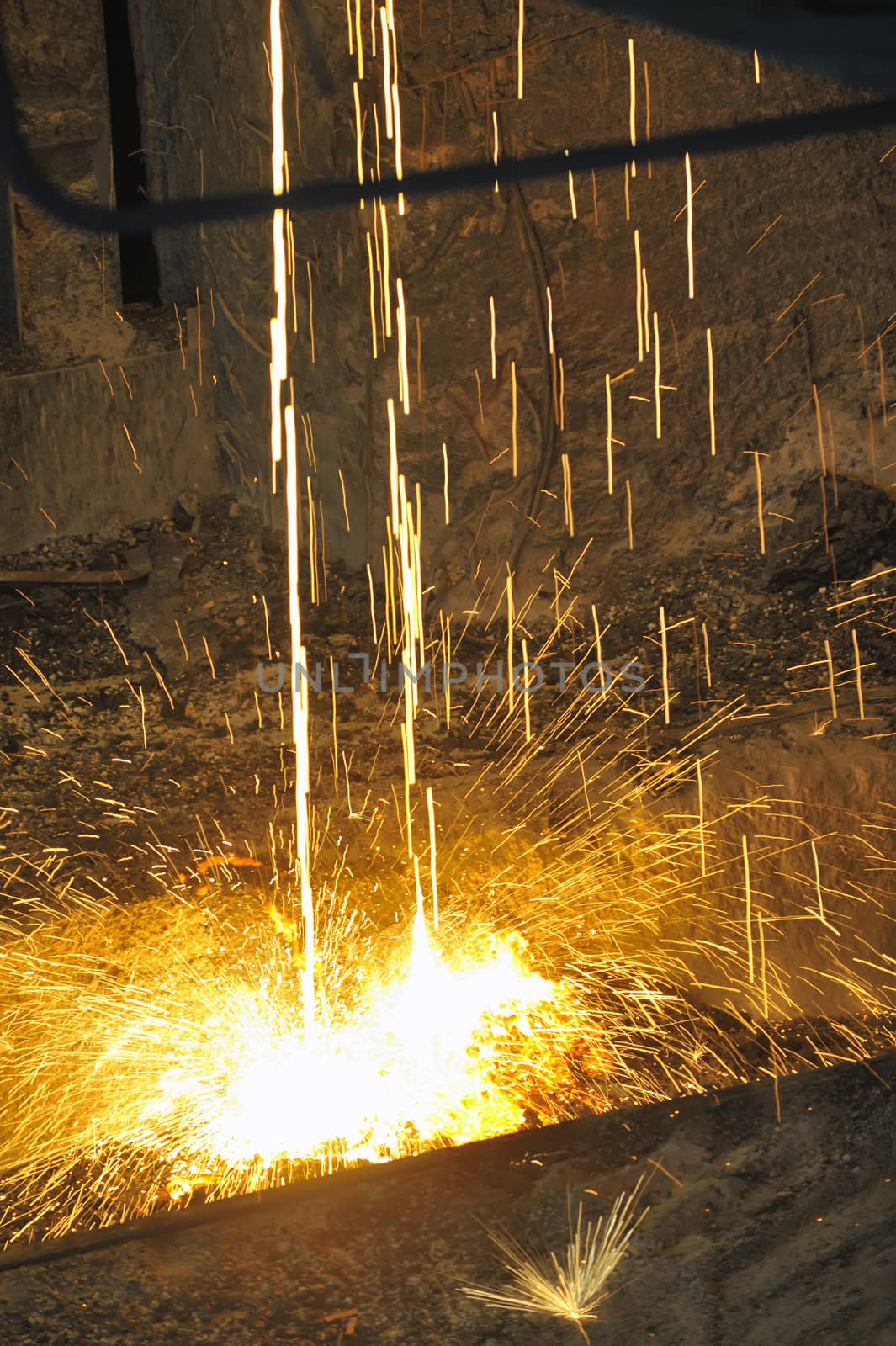 liquid metal pouring in Railroad containers inside of plant