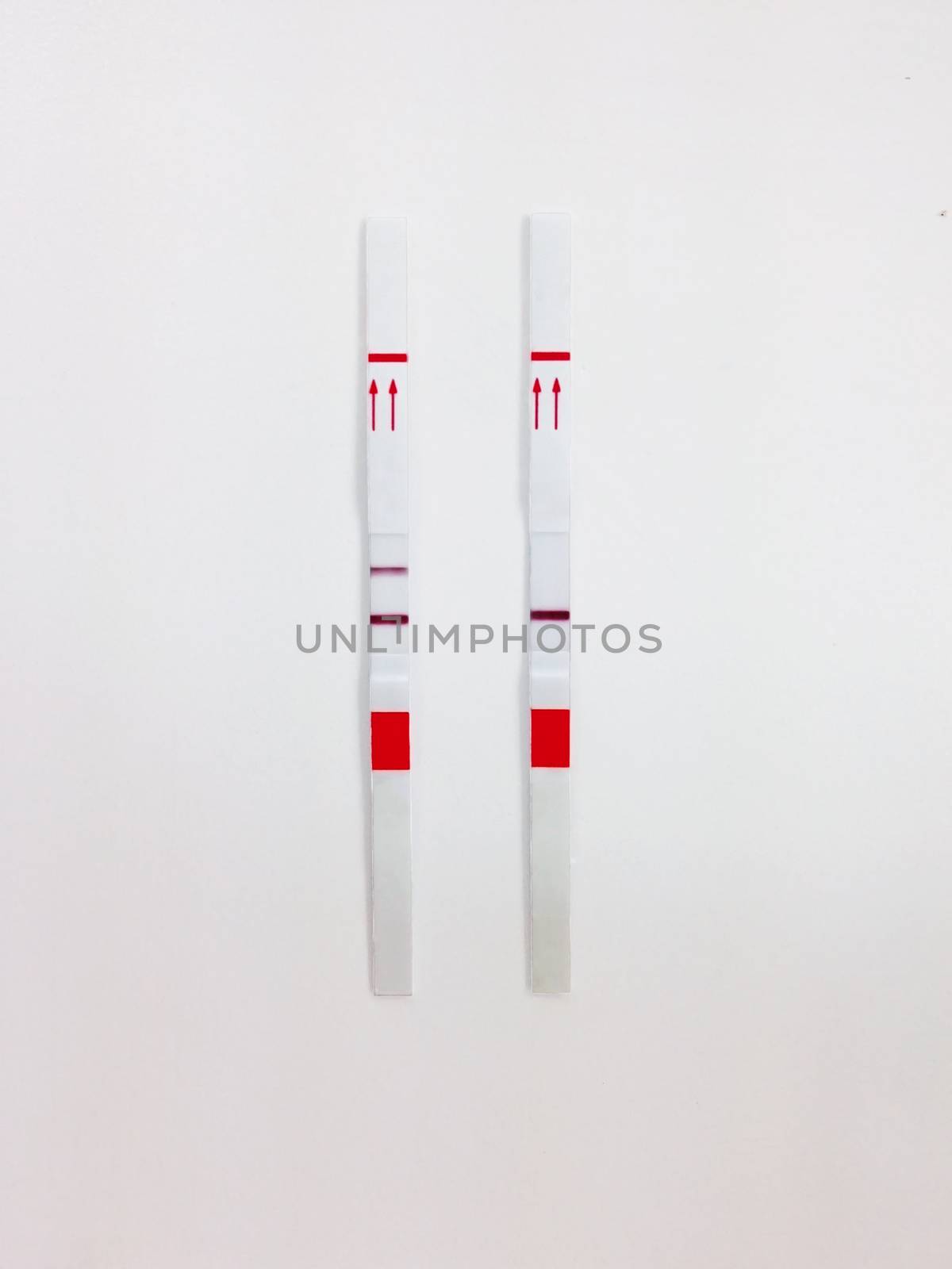 Positive and negative test cassette strips for analysis of HCG hormone or Negative and positive screening test casette strips for analysis of abused drug in the urine