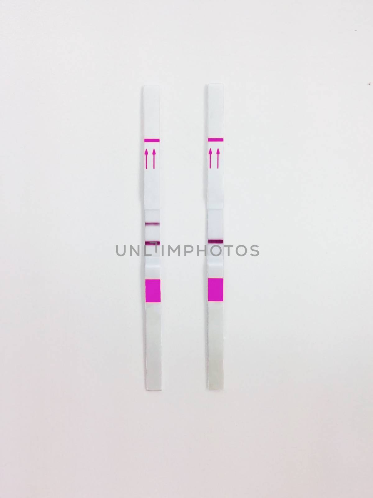 Positive and negative test cassette strips for analysis of HCG hormone or Negative and positive screening test casette strips for analysis of abused drug in the urine