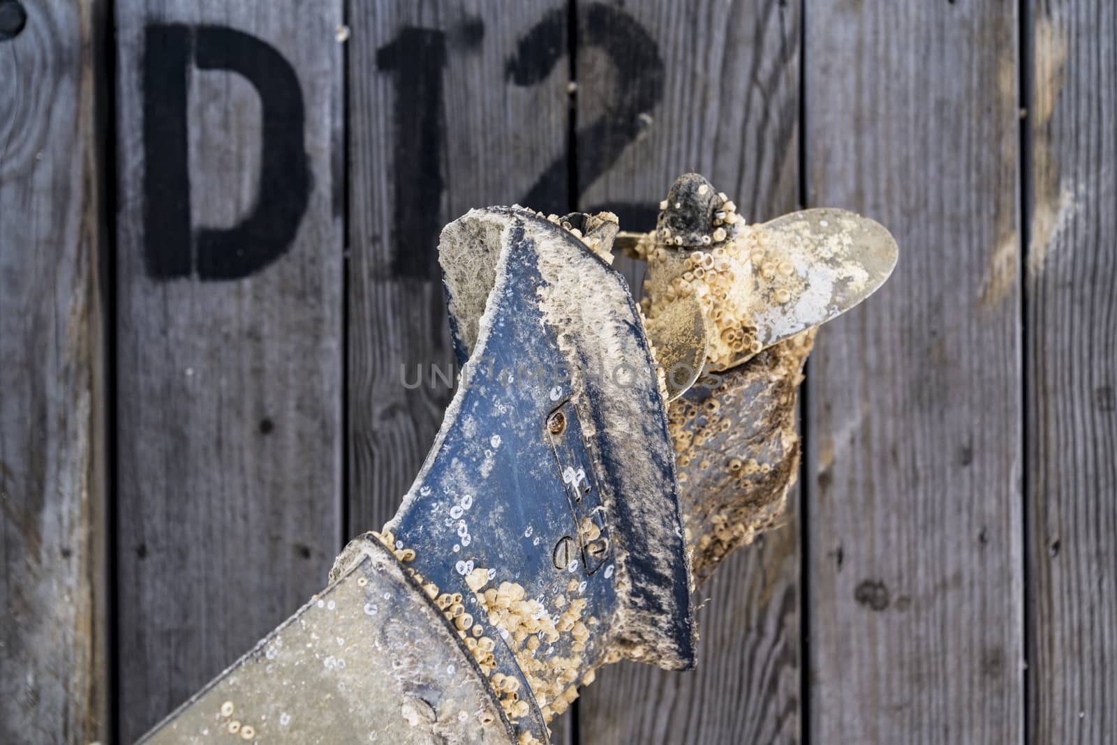 rusty and dirty ocean boat propeller helix