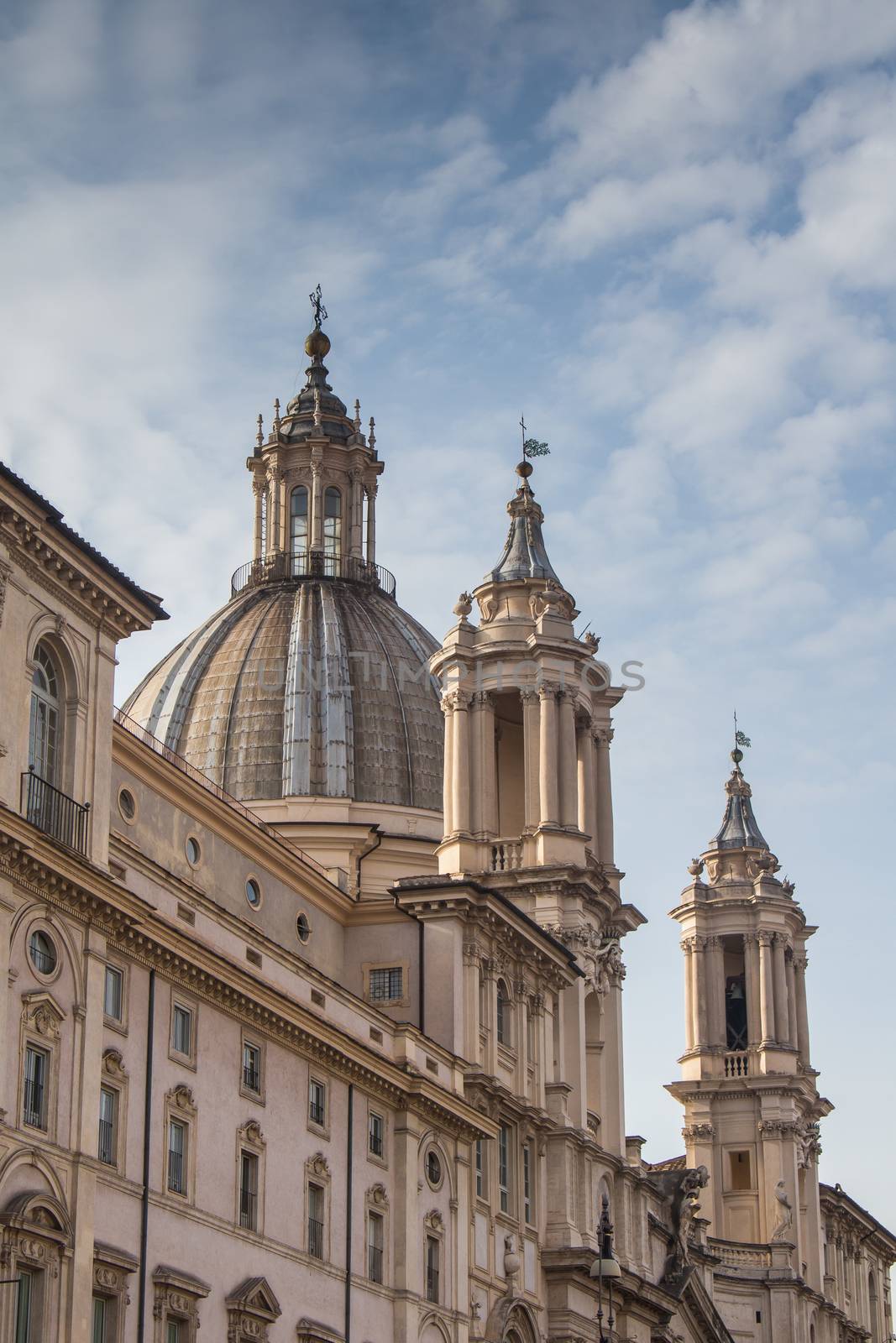 Church Sant' Agnese in Agone at Piazza Navona is a 17. century baroque church in Rome, Italy. Cloudy sky in the background.