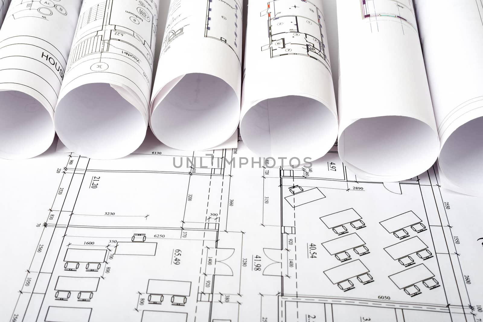 Architecture plan and rolls of blueprints. Building concept