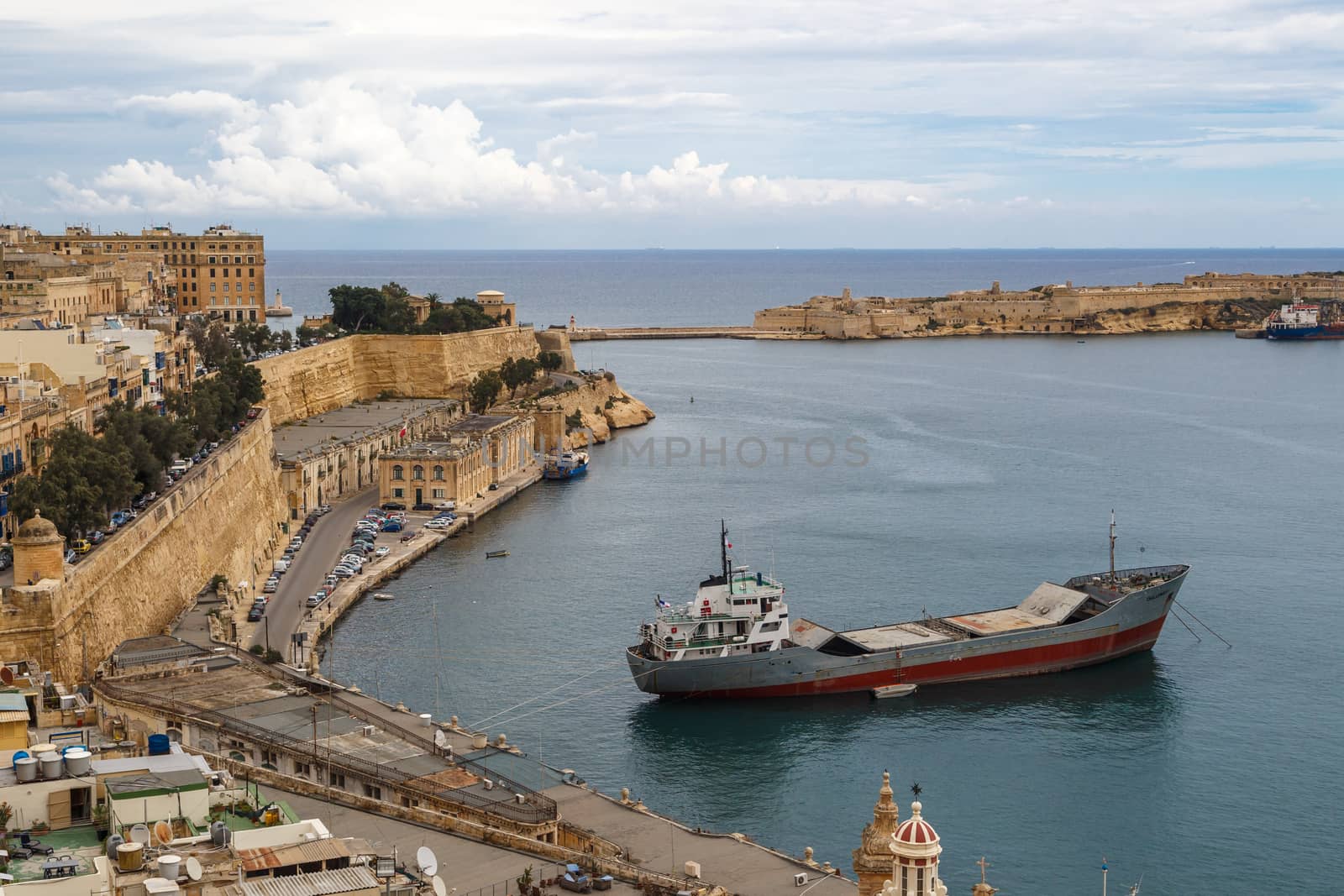 VALLETTA, MALTA - OCTOBER 30, 2015 : General view of Valletta, Malta island with seascape, port and historical limestone buildings from medieval times.