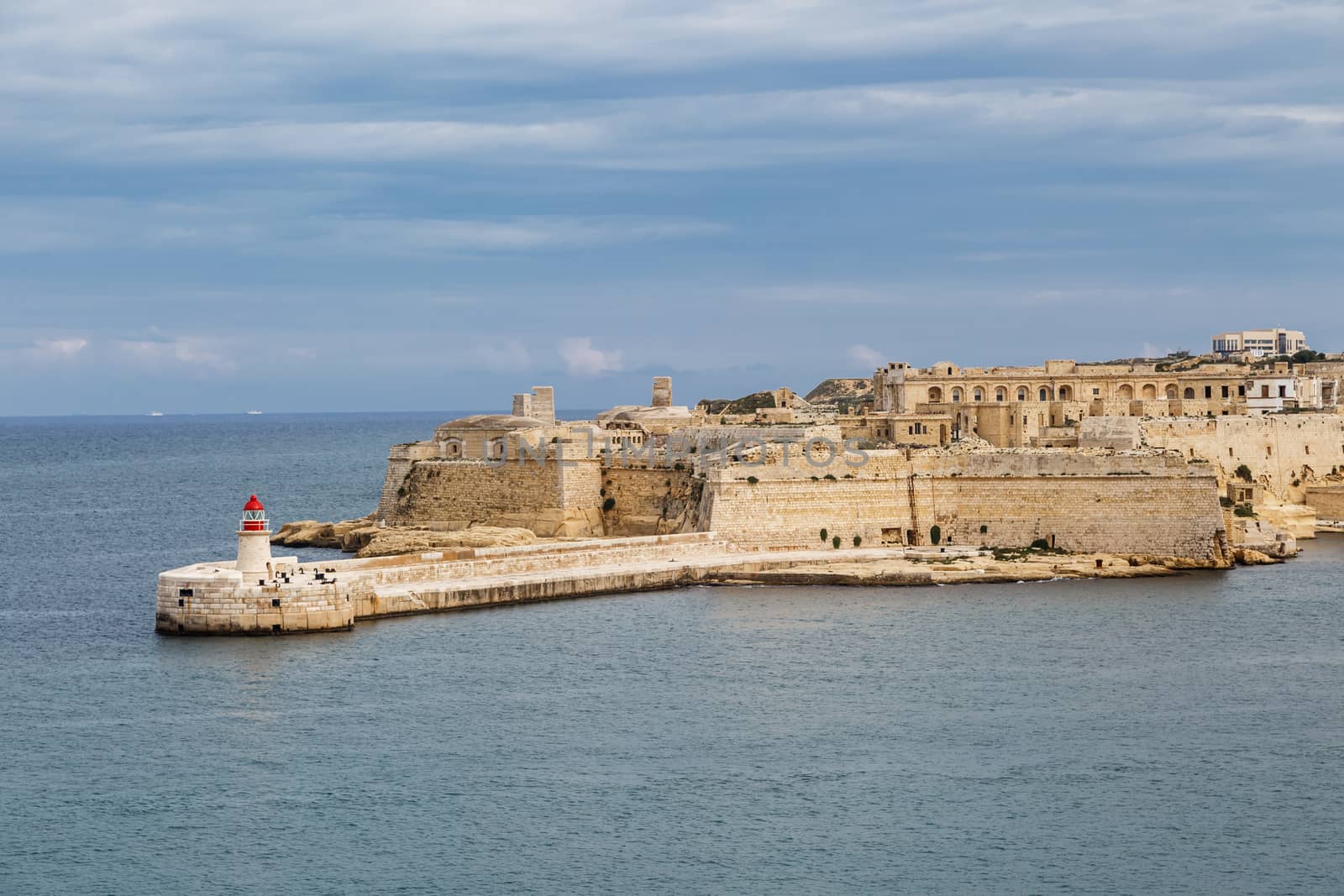 General view of Valletta, Malta island with seascape, port and historical limestone buildings from medieval times.