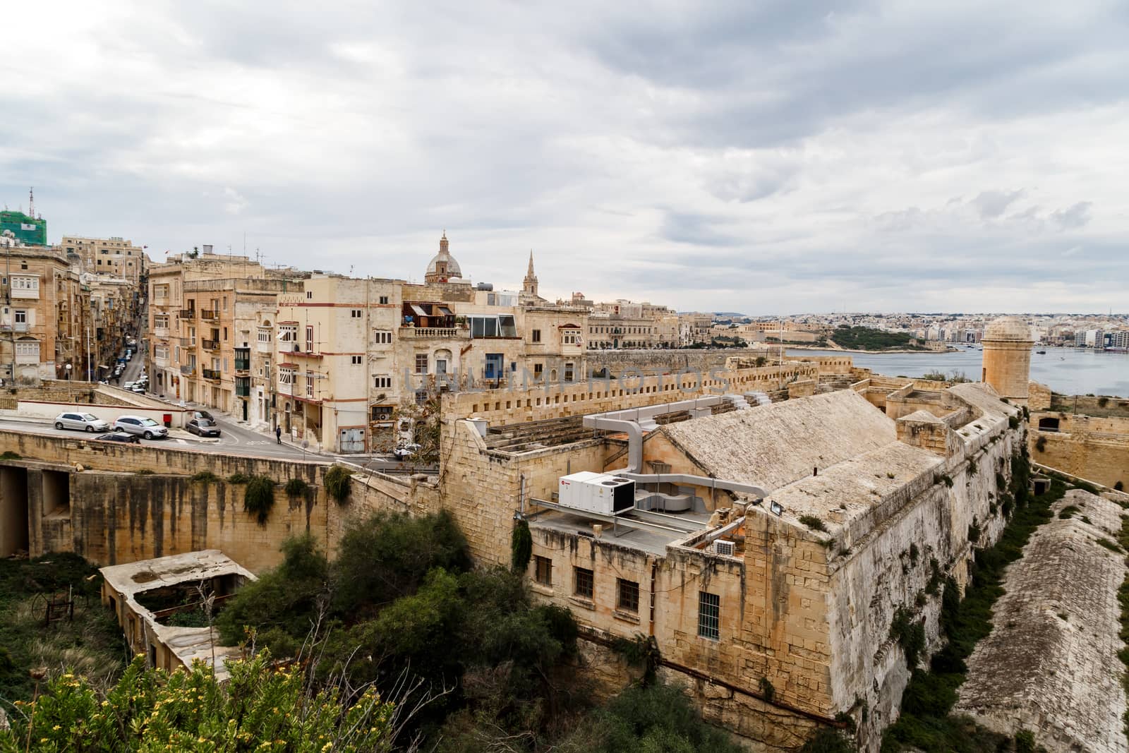 VALLETTA, MALTA - OCTOBER 30, 2015 : General view of Valletta cityscape at Malta island with historical limestone buildings from medieval times.
