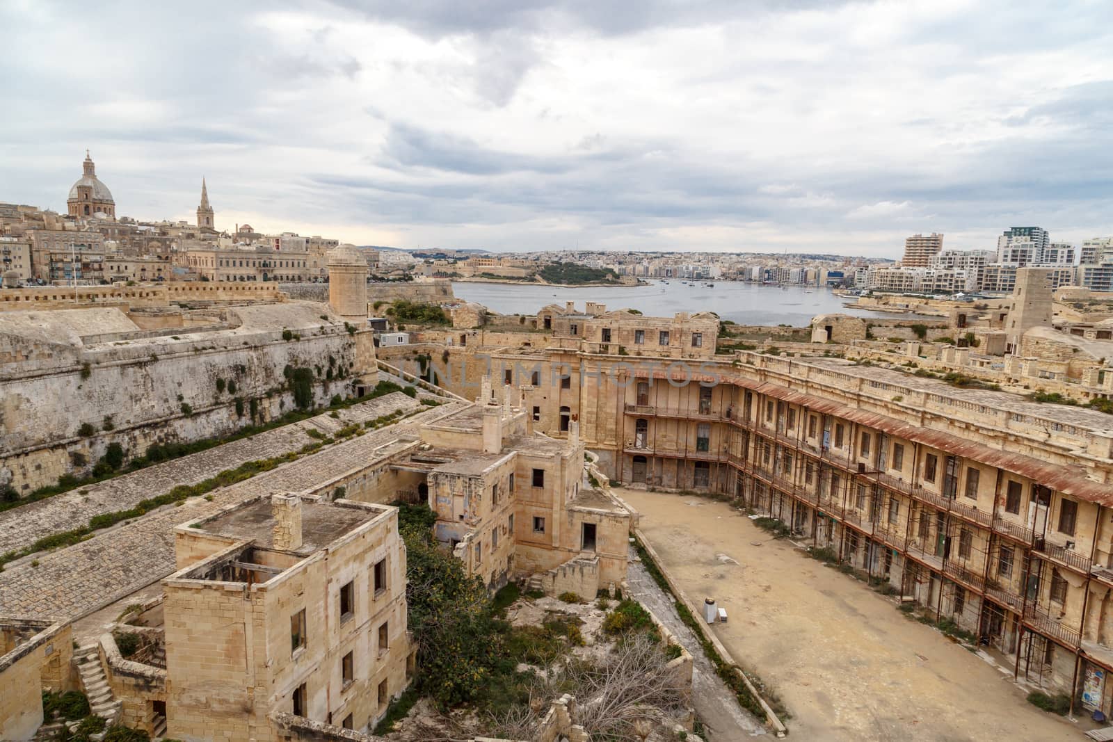 General view of Valletta cityscape at Malta island with historical limestone buildings from medieval times.