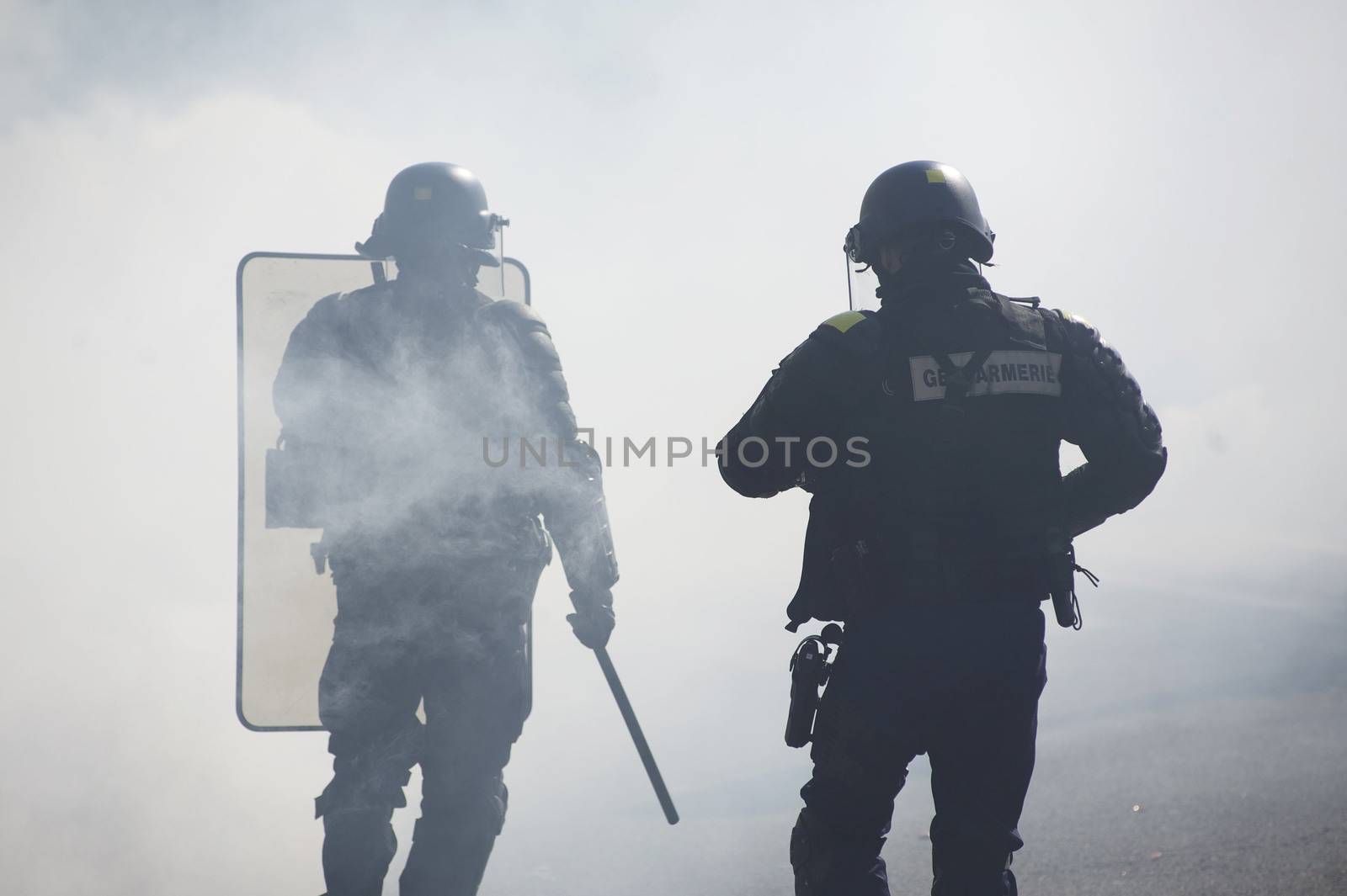FRANCE, Paris: Riot police officers face demonstrators during a student demonstration against French government Labour Law reform in Paris on March 17, 2016.