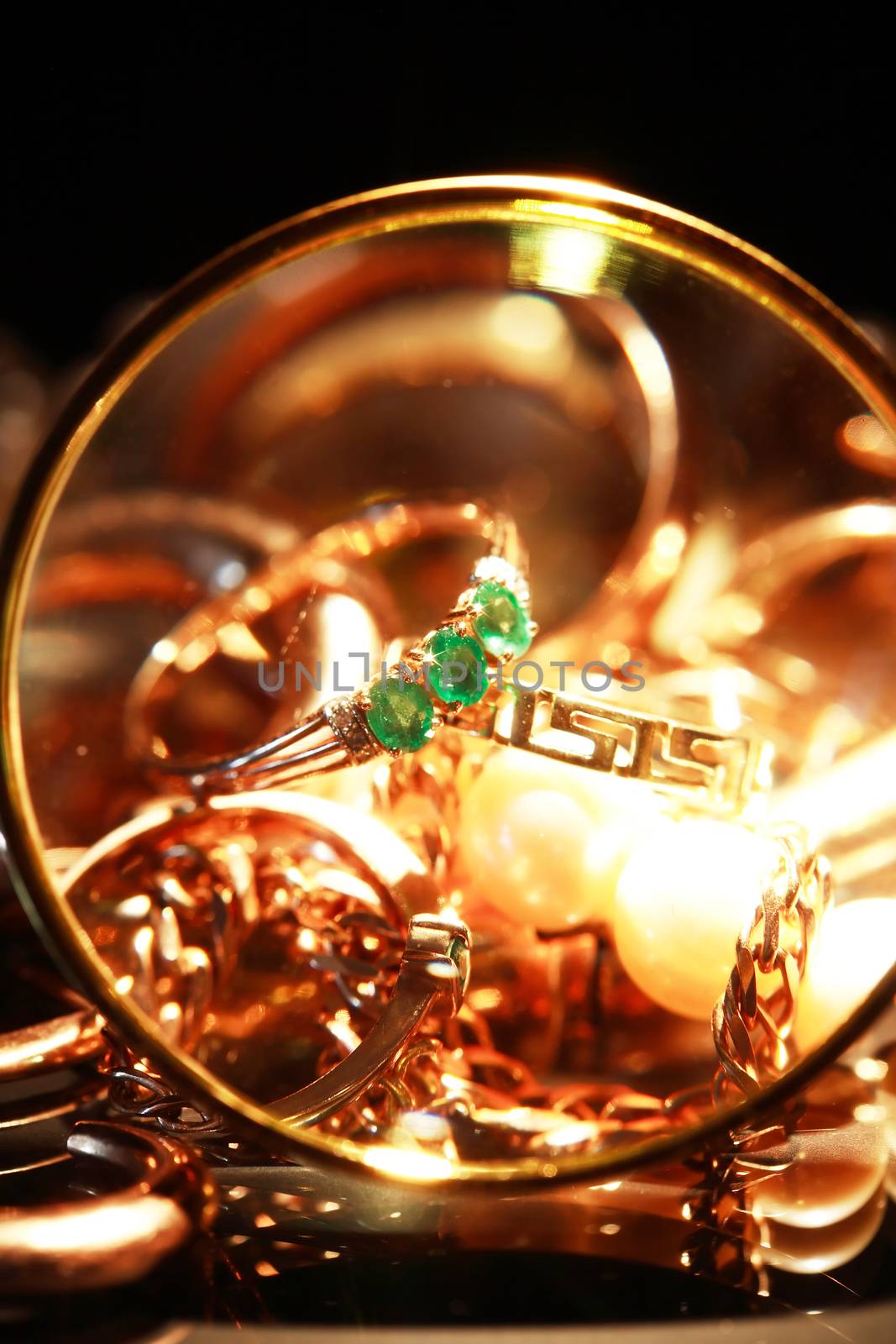 Set of various jewelry adornments through the magnifying glass