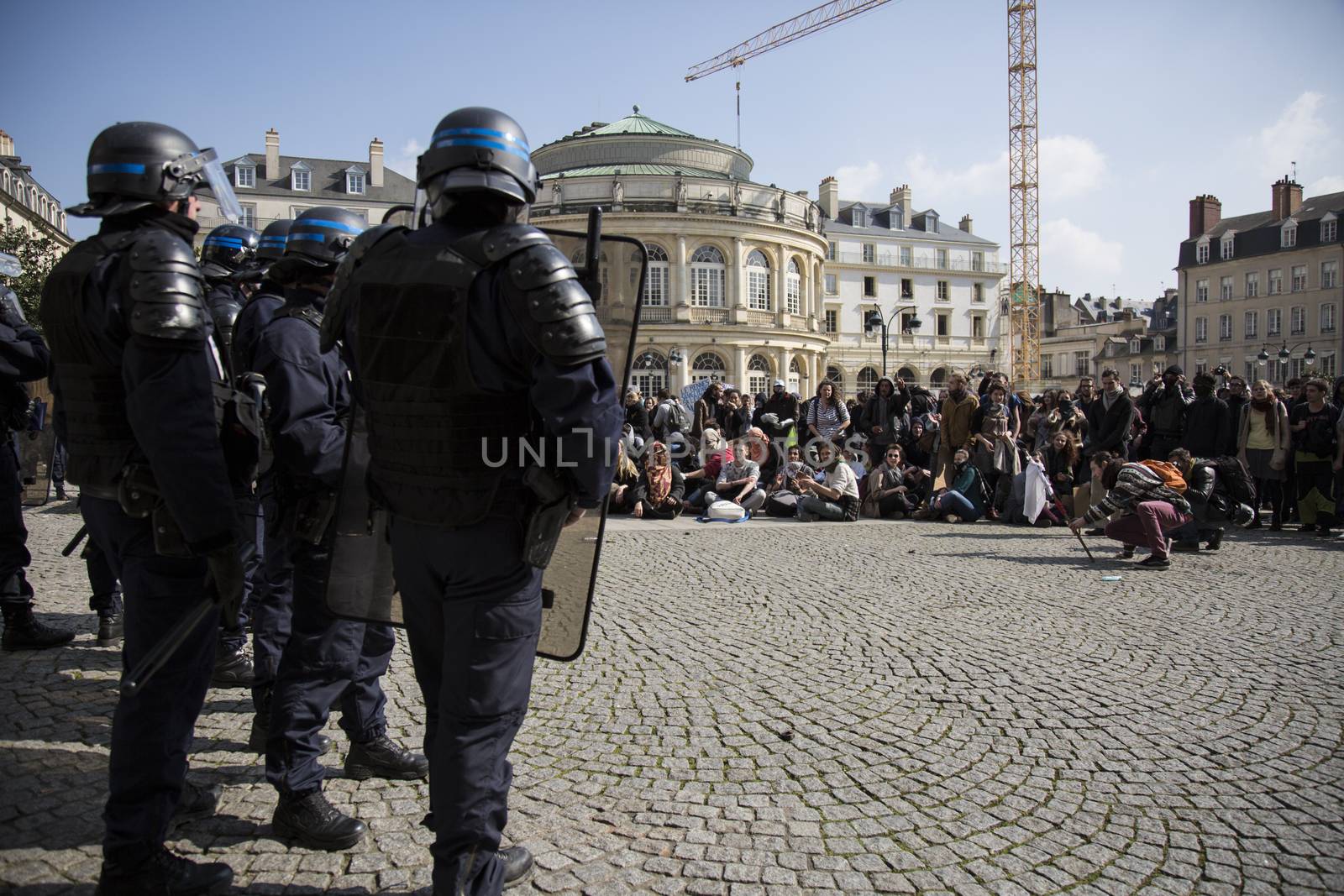 FRANCE, Paris: High school students and youths demonstrate in front of Rennes' town hall, western France,  during a protest march opposing the government's labour reforms on March 17, 2016. The contested reform is designed to inject more flexibility into the labour market by dropping key measures that would have benefited smaller companies. In a significant change from the original text, French Prime minister said on Monday that small and medium-sized companies would not be able to unilaterally introduce flexible work practices into their working week.