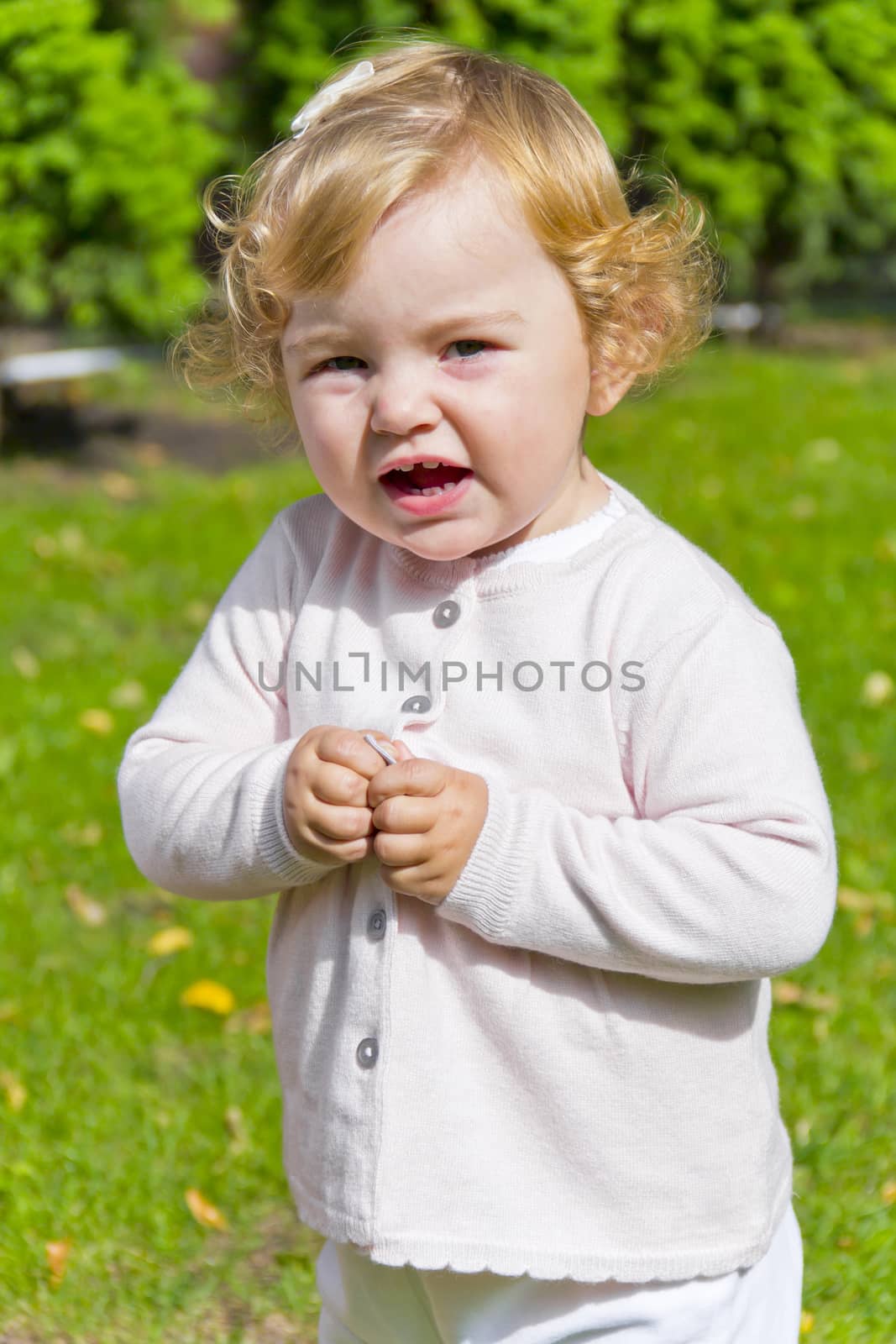 Caucasian beautiful cute infant girl in summer