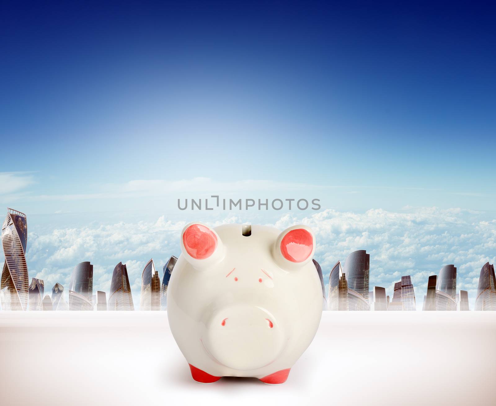 Piggy bank on cityscape by cherezoff