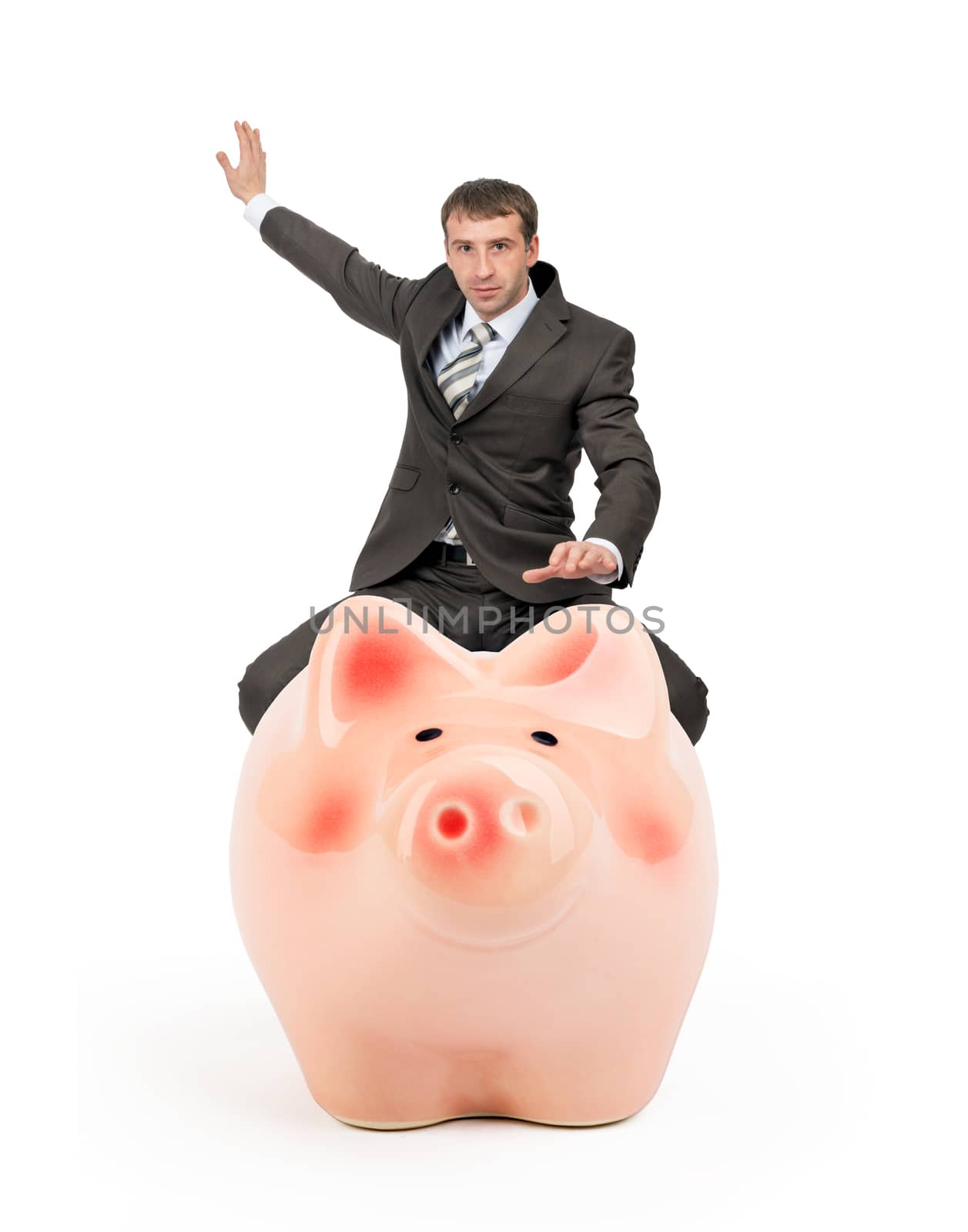 Businessman riding pigy bank isolated on white background, business concept