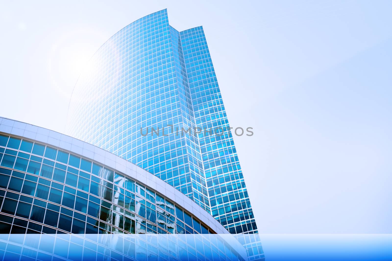 Skyscraper with word business and sun, business concept